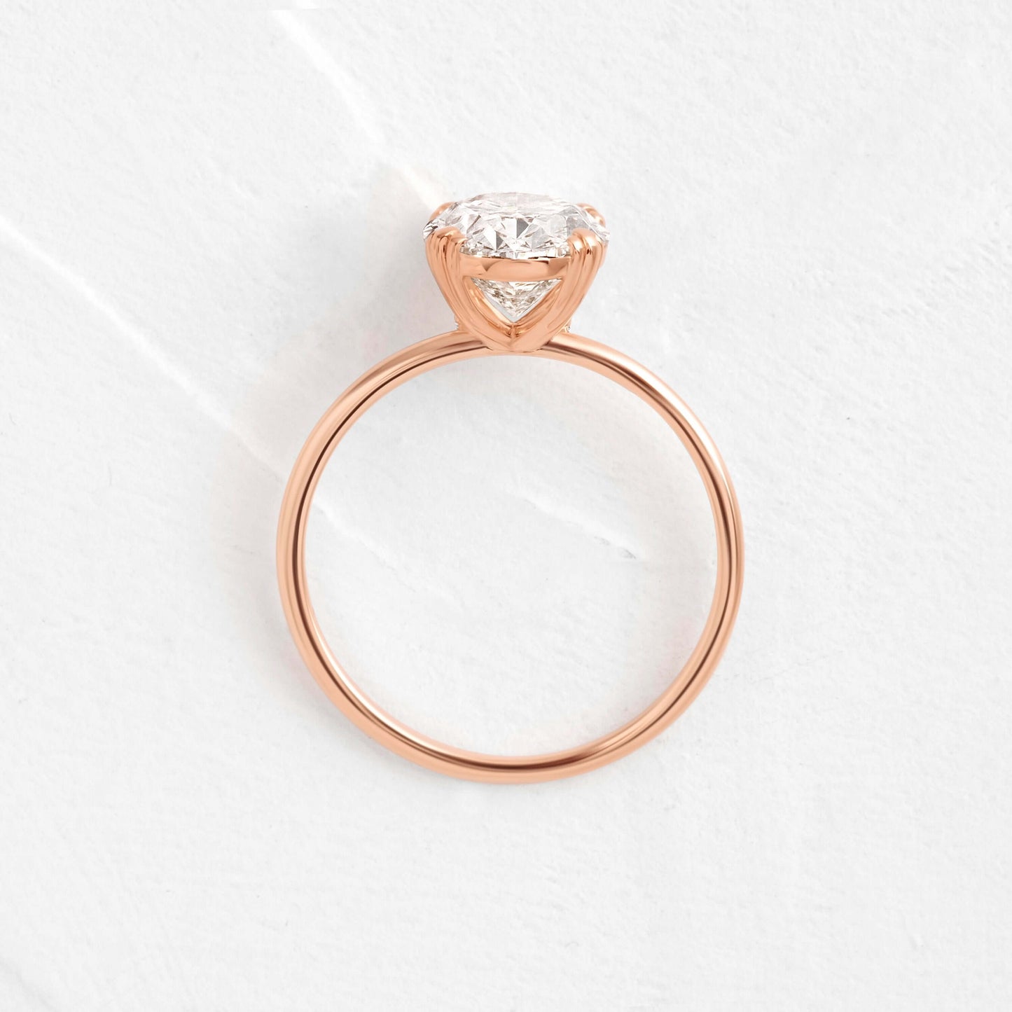 Solitaire Triple Prong with Hidden Stones-Oval Lab Grown Diamond Engagement Ring - On model
