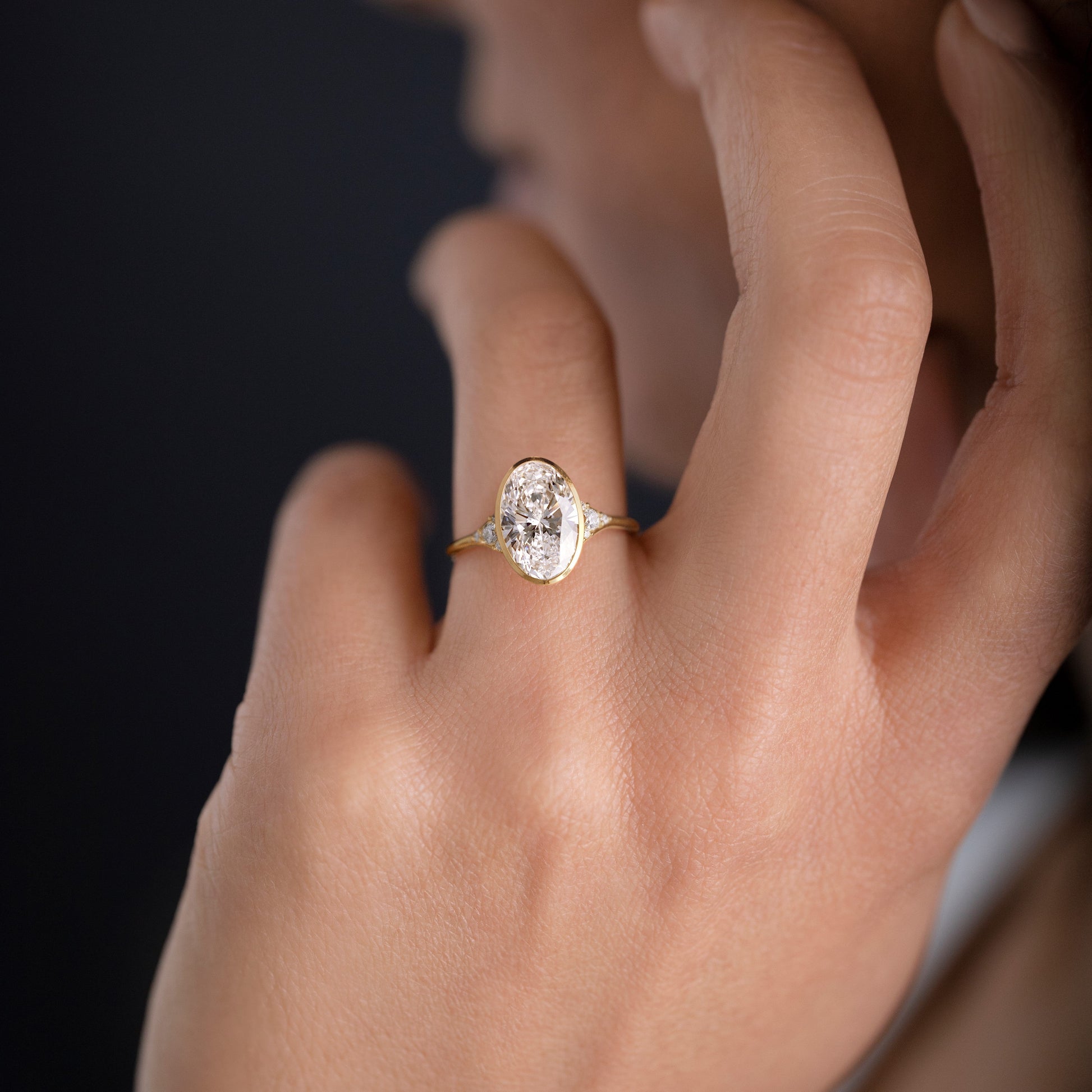 Bezel & Cluster Style-Oval Lab Grown Diamond Engagement Ring - Detail view