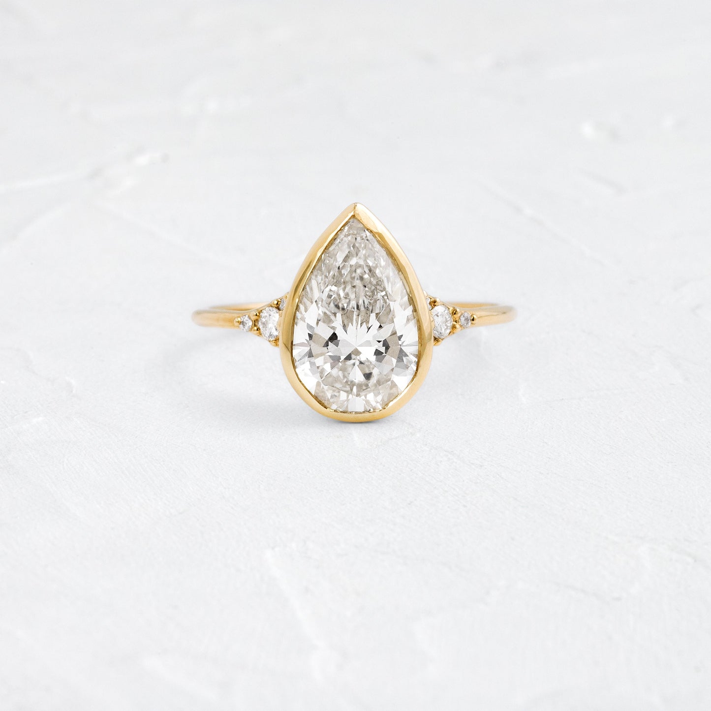 Bezel & Cluster Style-Pear Lab Grown Diamond Engagement Ring - Front view