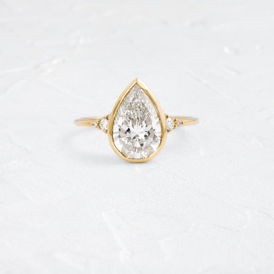 Bezel & Cluster Style-Pear Lab Grown Diamond Engagement Ring - Front view