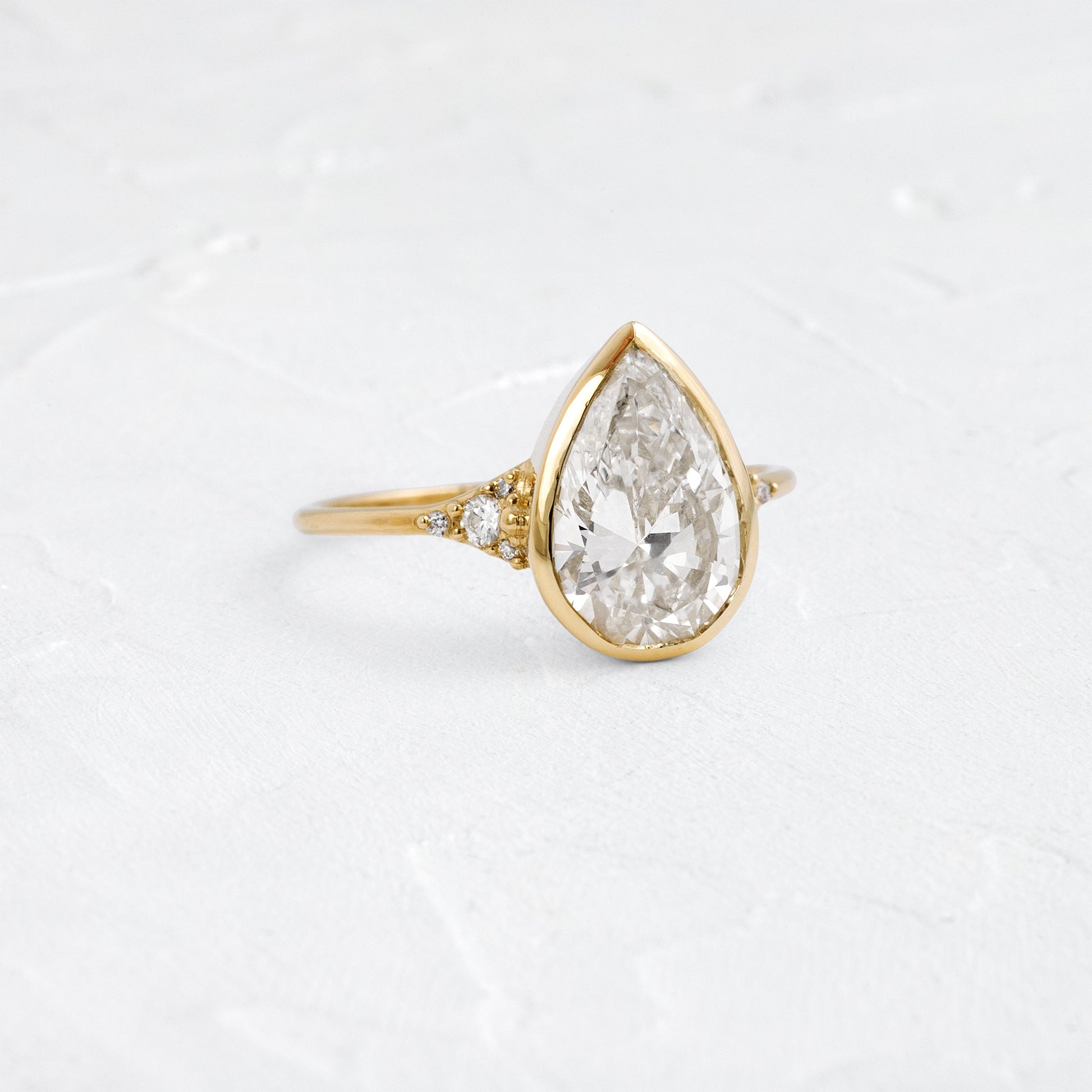 Bezel & Cluster Style-Pear Lab Grown Diamond Engagement Ring - Front view