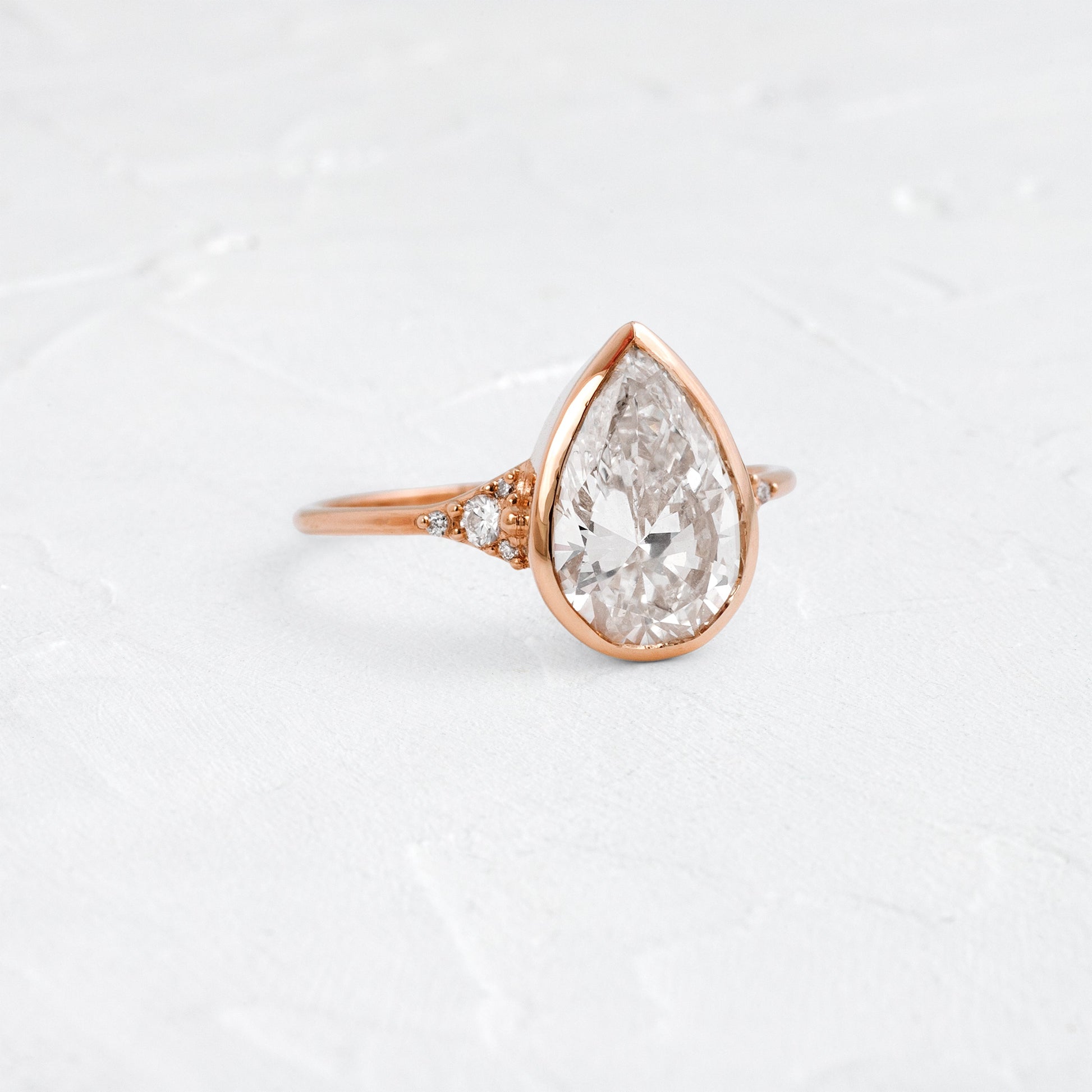 Bezel & Cluster Style-Pear Lab Grown Diamond Engagement Ring - Detail view