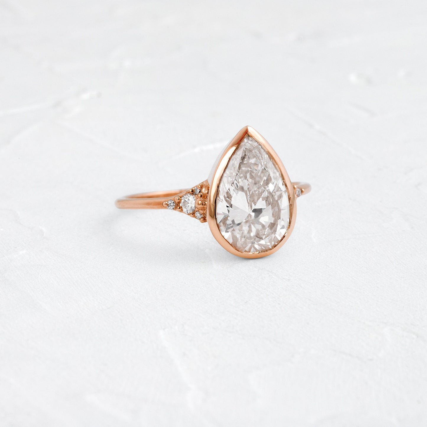 Bezel & Cluster Style-Pear Lab Grown Diamond Engagement Ring - Detail view