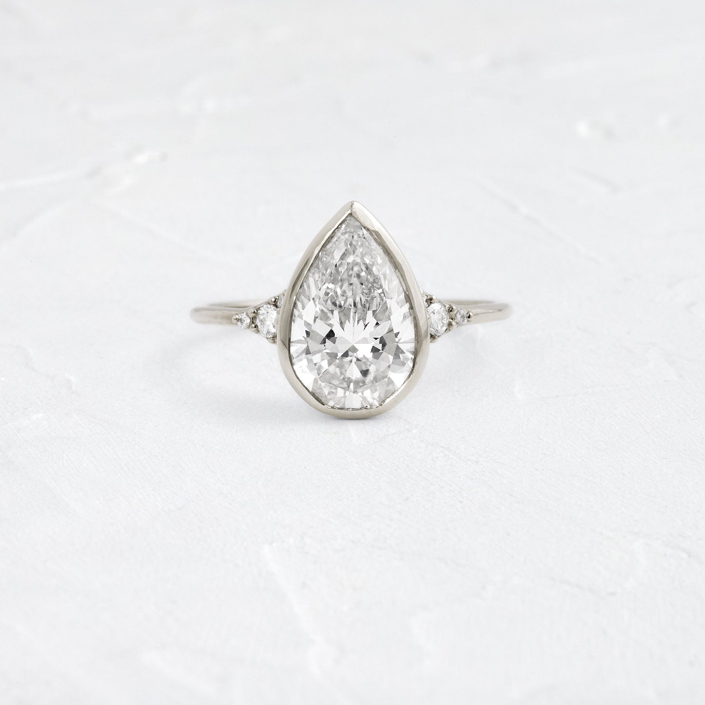Bezel & Cluster Style-Pear Lab Grown Diamond Engagement Ring - Lifestyle