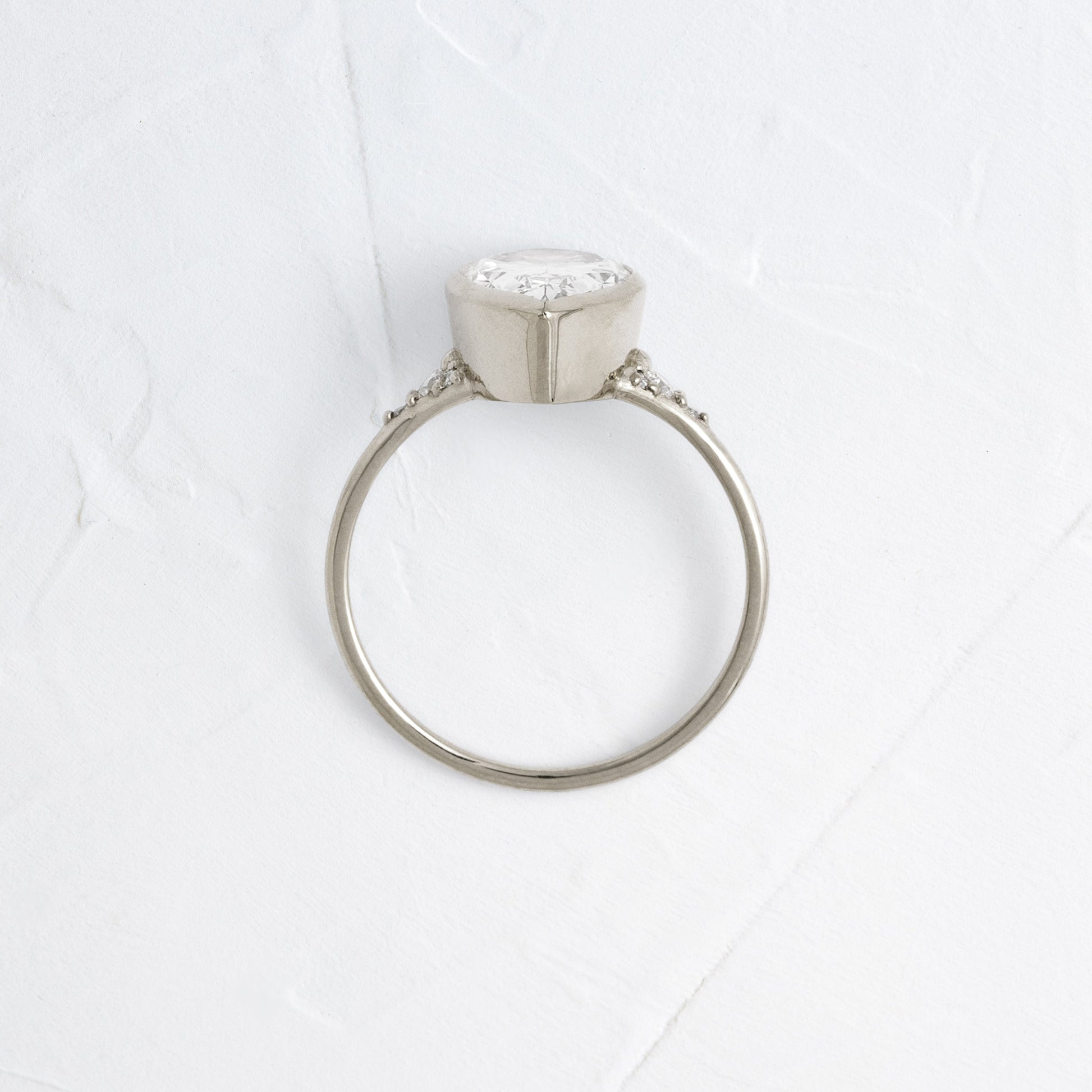 Bezel & Cluster Style-Pear Lab Grown Diamond Engagement Ring - Side view