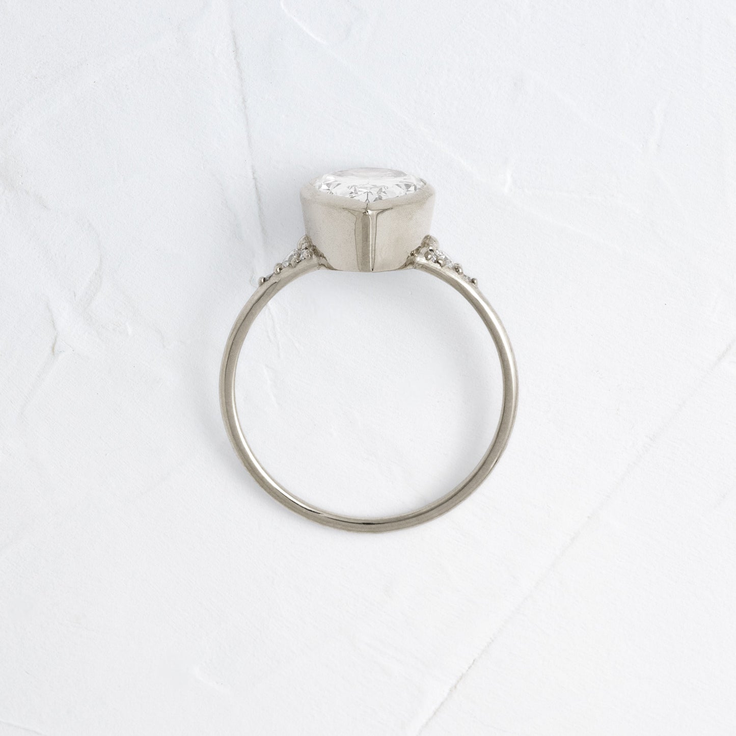 Bezel & Cluster Style-Pear Lab Grown Diamond Engagement Ring - Side view