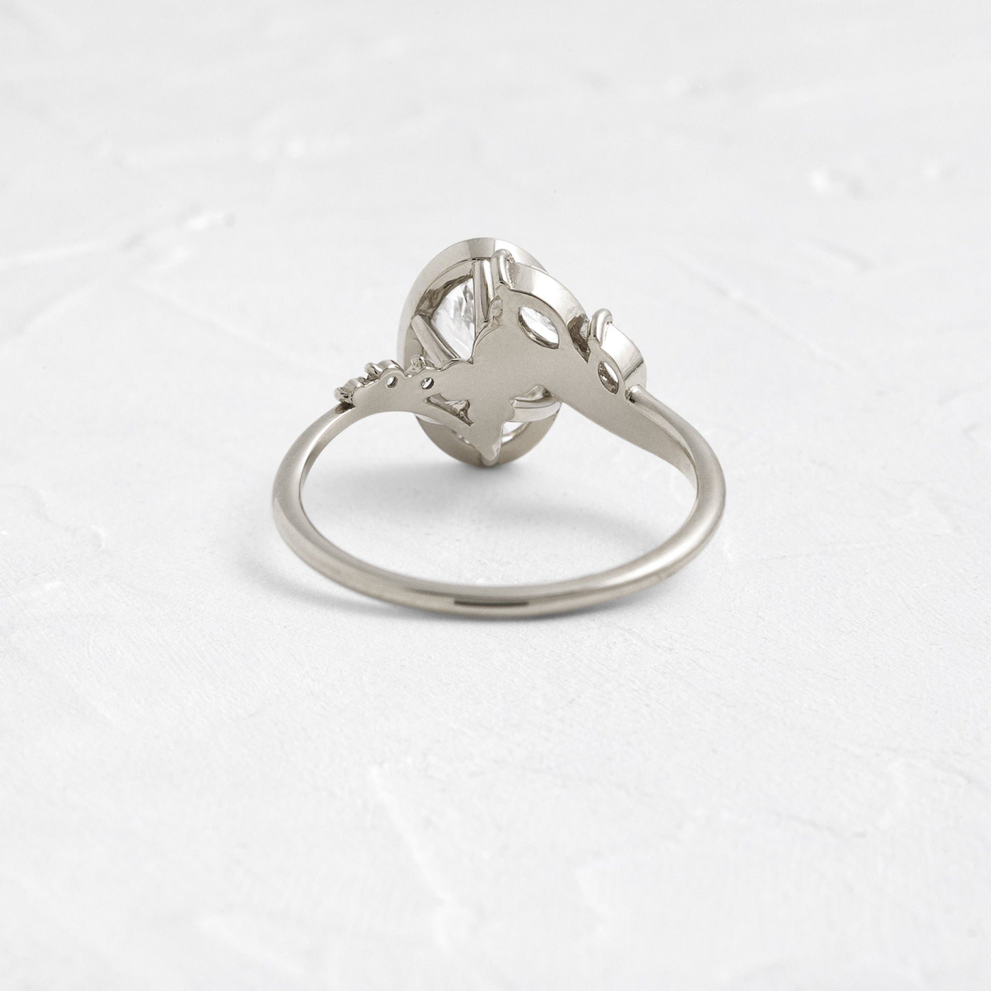 Bezel Dainty Style-Oval Lab Grown Diamond Engagement Ring - Side view