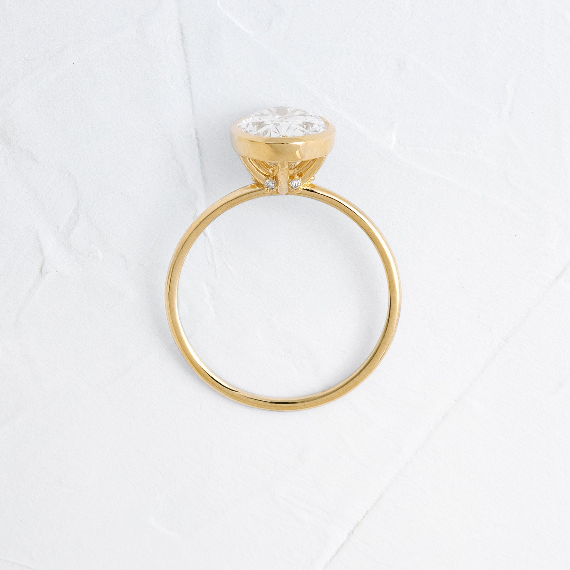 Bezel Hidden Stone-Oval Lab Grown Diamond Engagement Ring - Side view