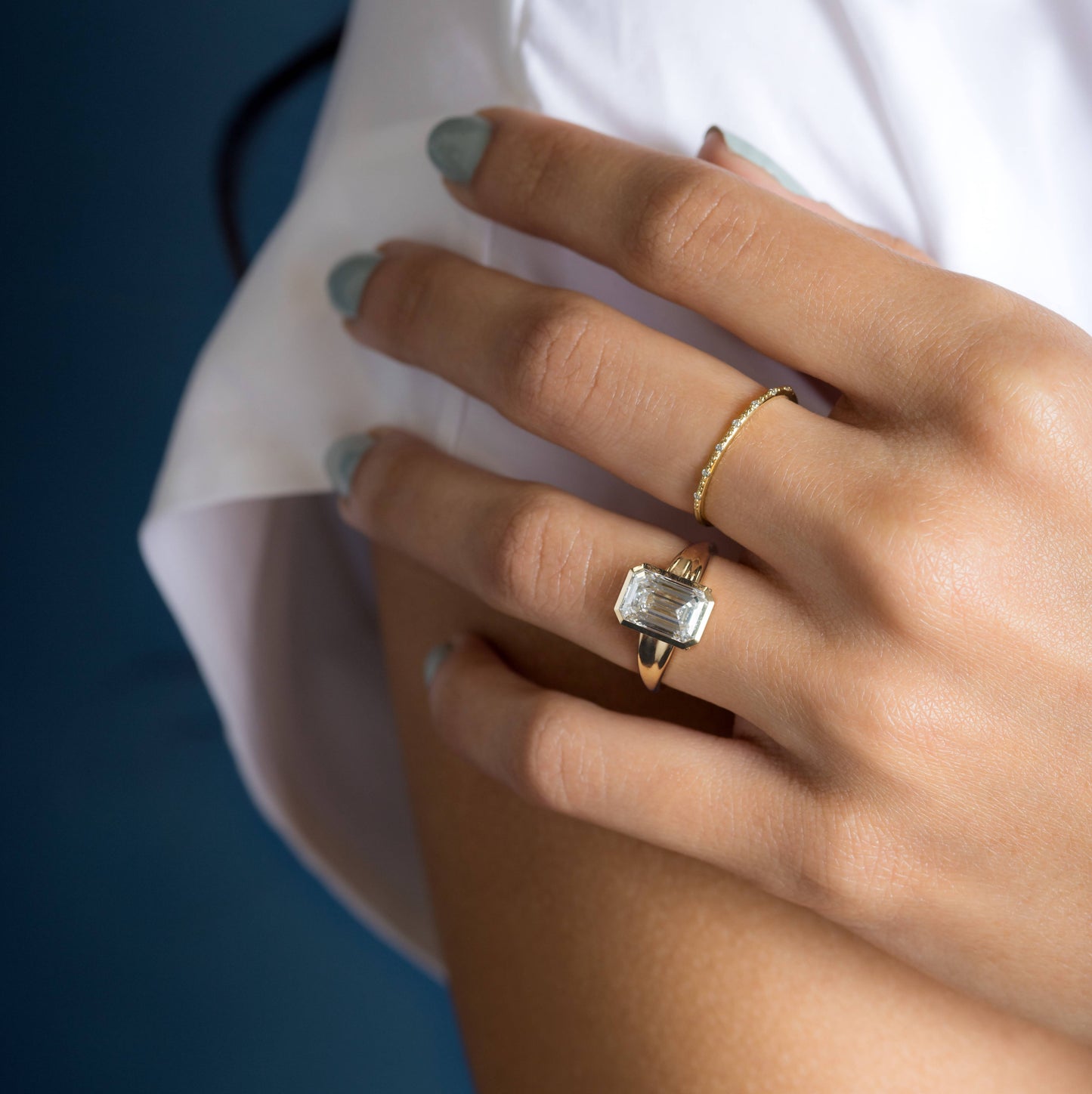 Bezel Tapered Shank with Hidden Stones-Emerald Lab Grown Diamond Engagement Ring - Lifestyle