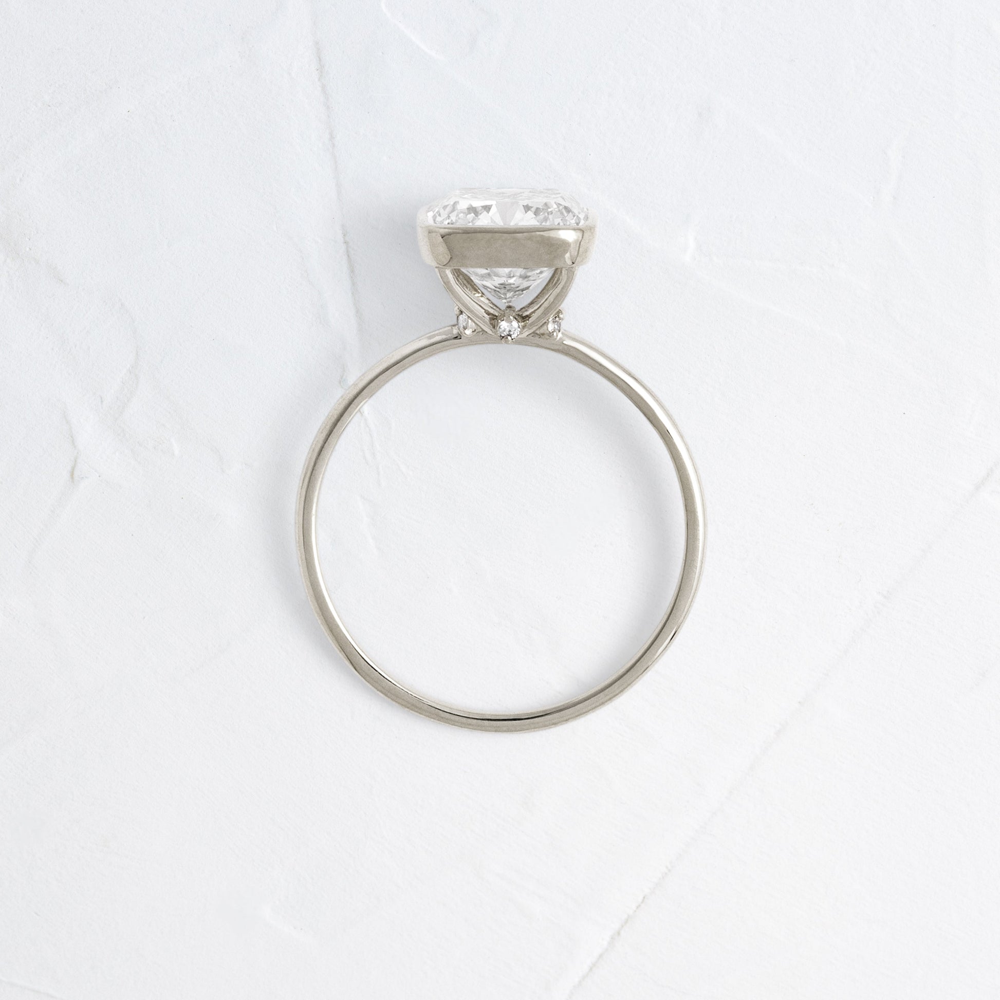 Bezel with Hidden Stone-Cushion Lab Grown Diamond Engagement Ring - On model