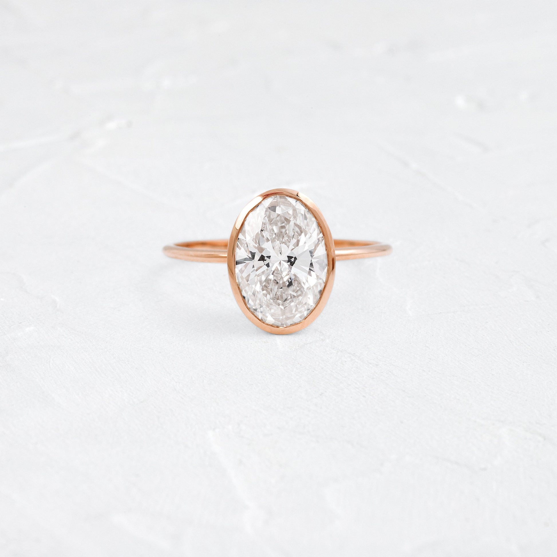 Bezel with Hidden Stones-Oval Lab Grown Diamond Engagement Ring - Detail view