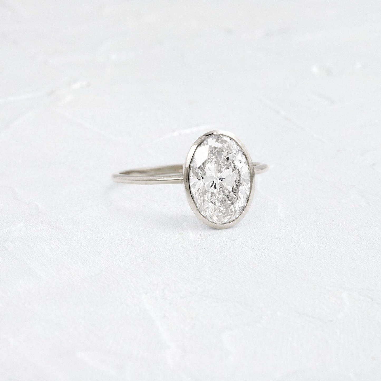 Bezel with Hidden Stones-Oval Lab Grown Diamond Engagement Ring - Lifestyle
