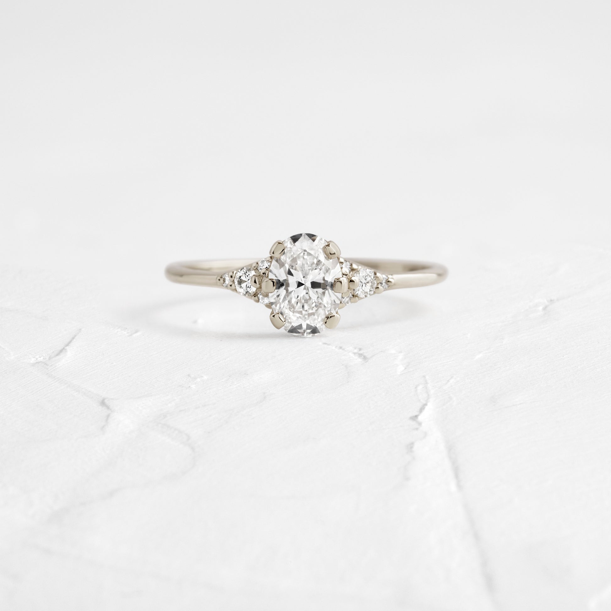 Cluster & Six Square Prong-Oval Lab Grown Diamond Engagement Ring - Front view