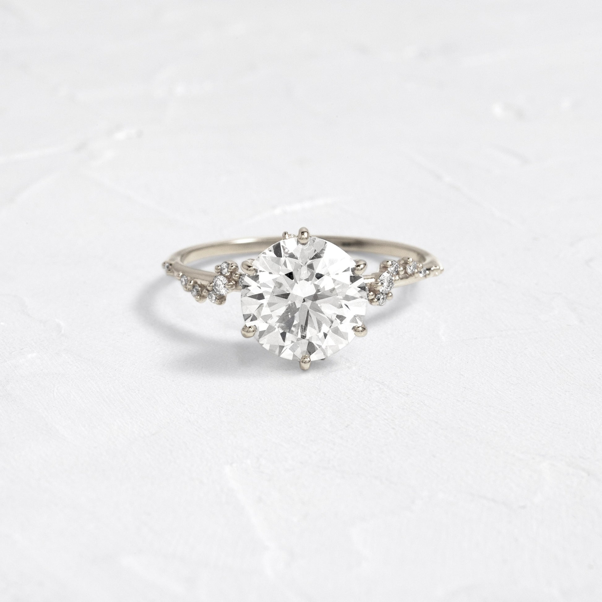 Cluster with Hidden Stone-Round Lab Grown Diamond Engagement Ring - Front view