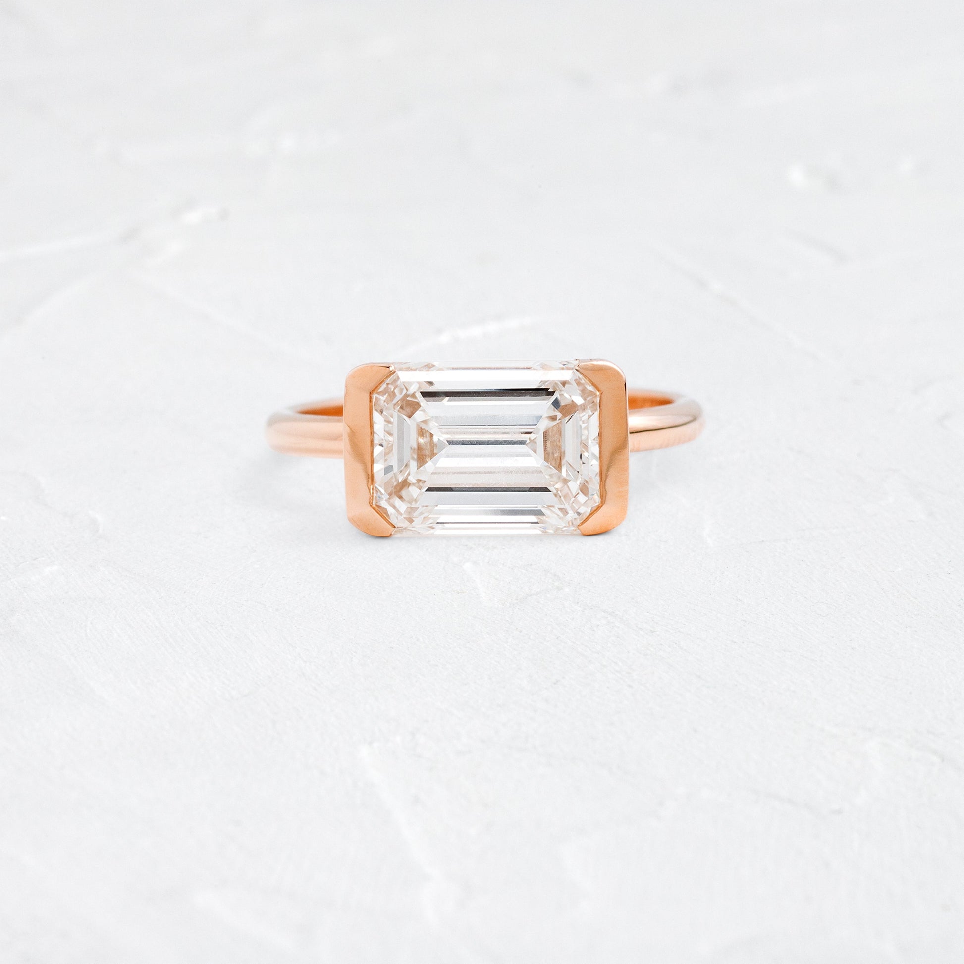 East West Solitaire Half Bezel-Emerald Lab Grown Diamond Engagement Ring - Lifestyle