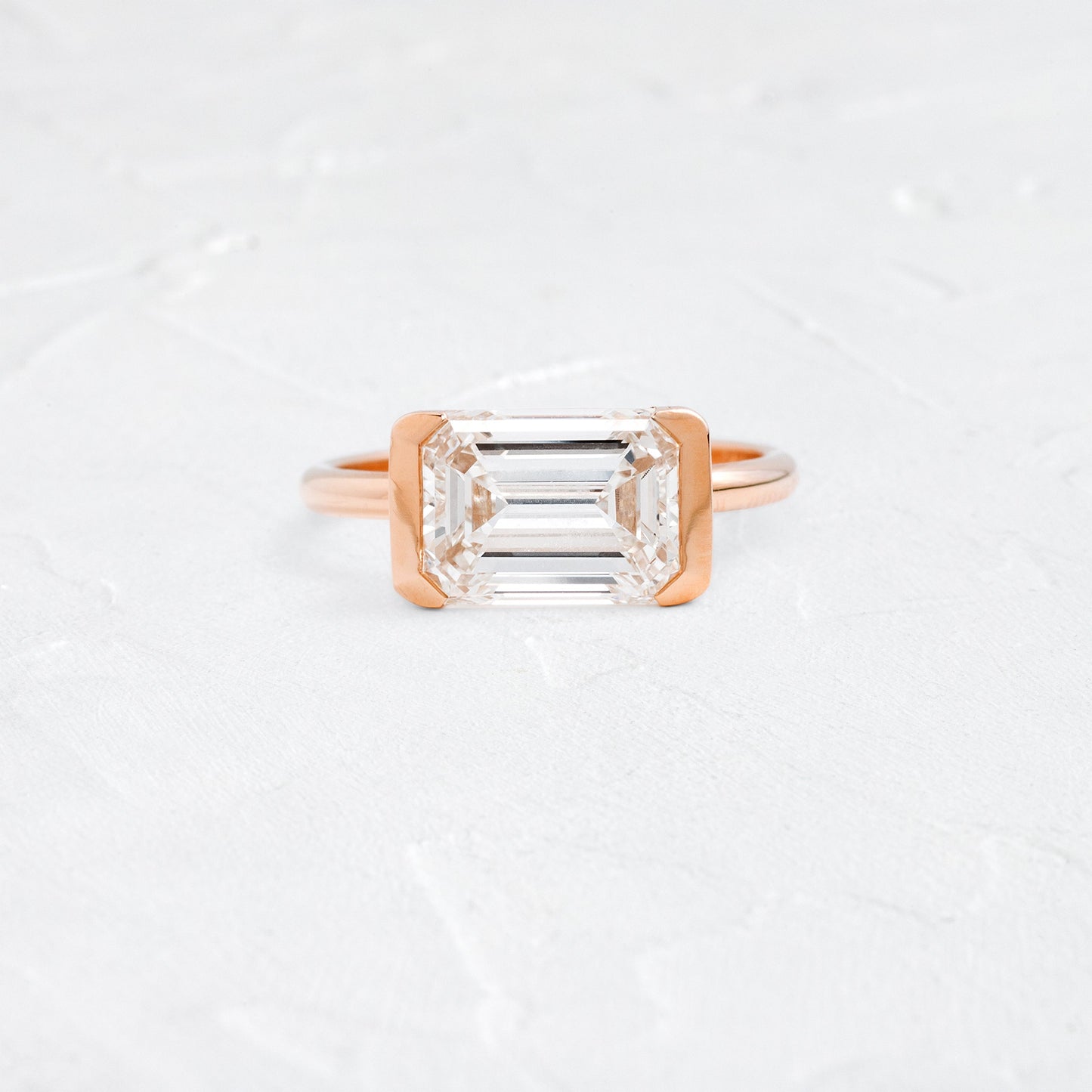 East West Solitaire Half Bezel-Emerald Lab Grown Diamond Engagement Ring - Lifestyle