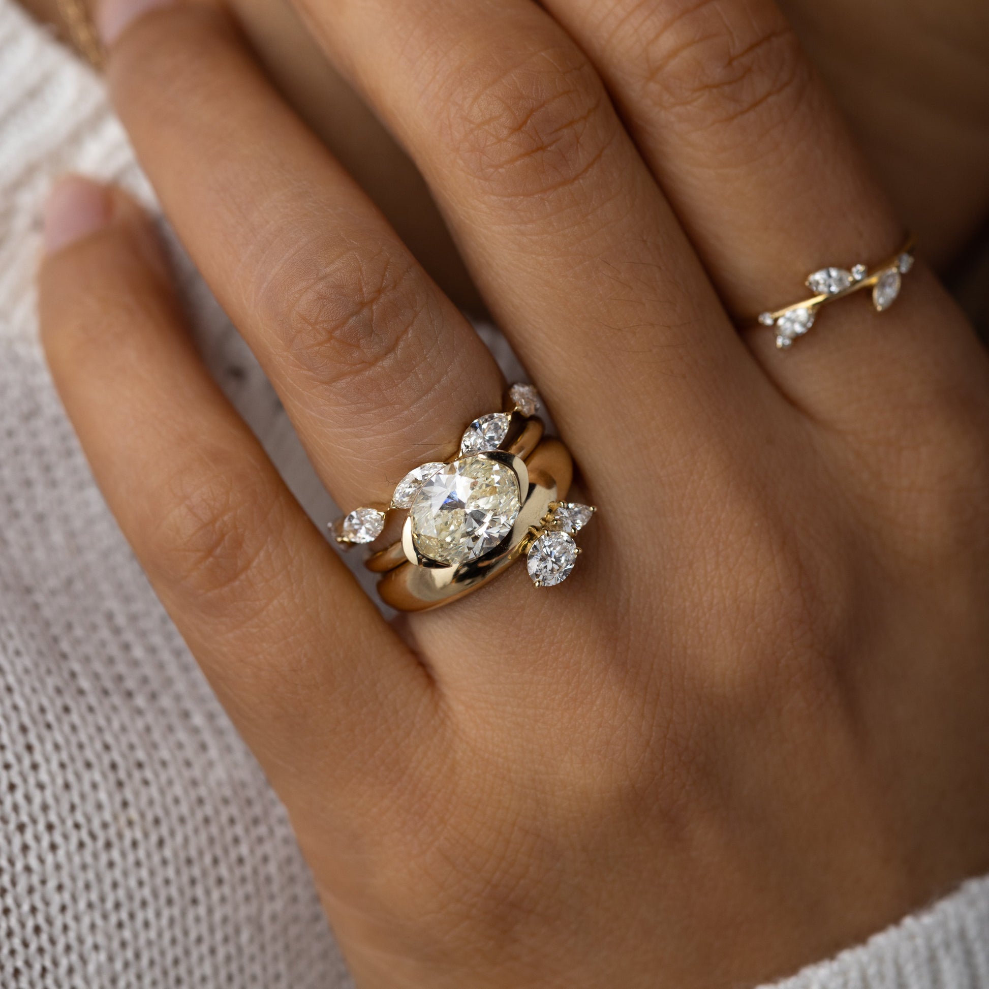 East West Solitaire Half Bezel-Oval Lab Grown Diamond Engagement Ring - Detail view
