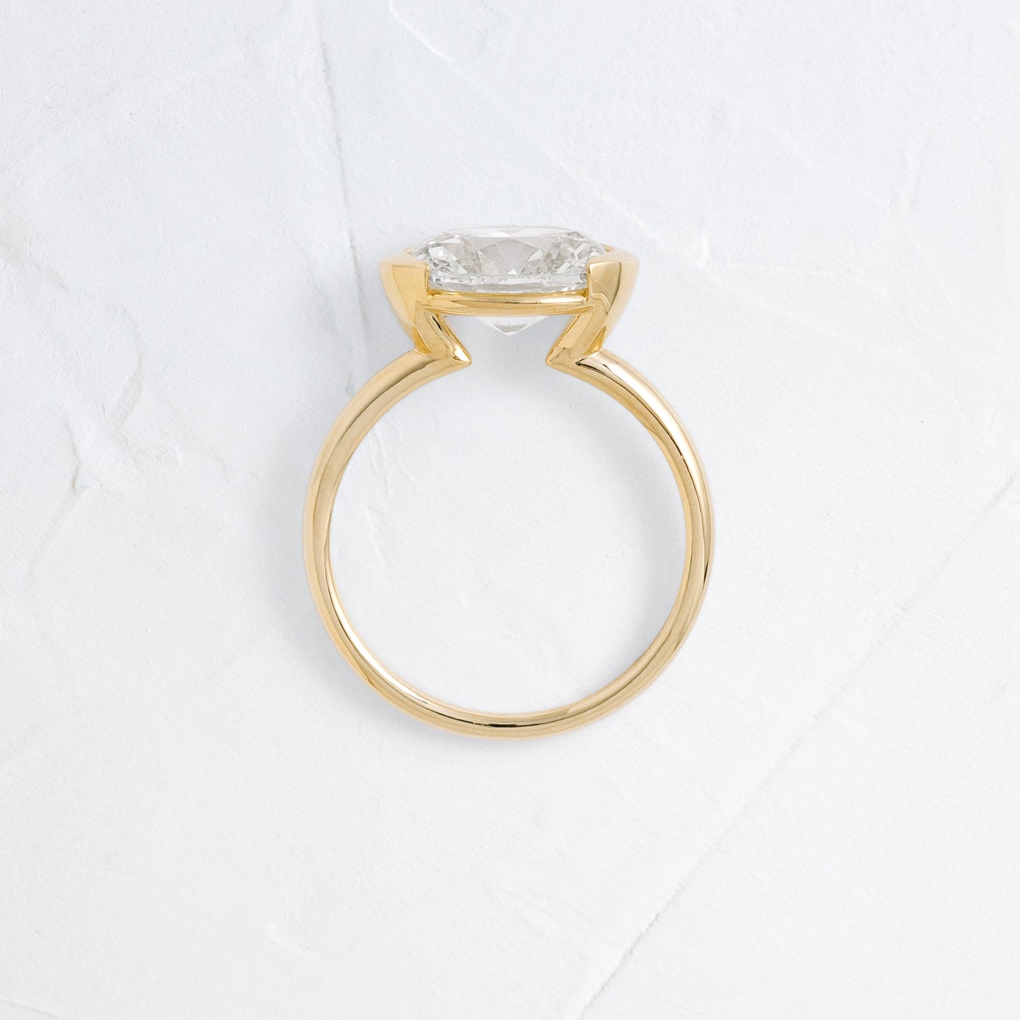 East West Solitaire Half Bezel-Oval Lab Grown Diamond Engagement Ring - Side view