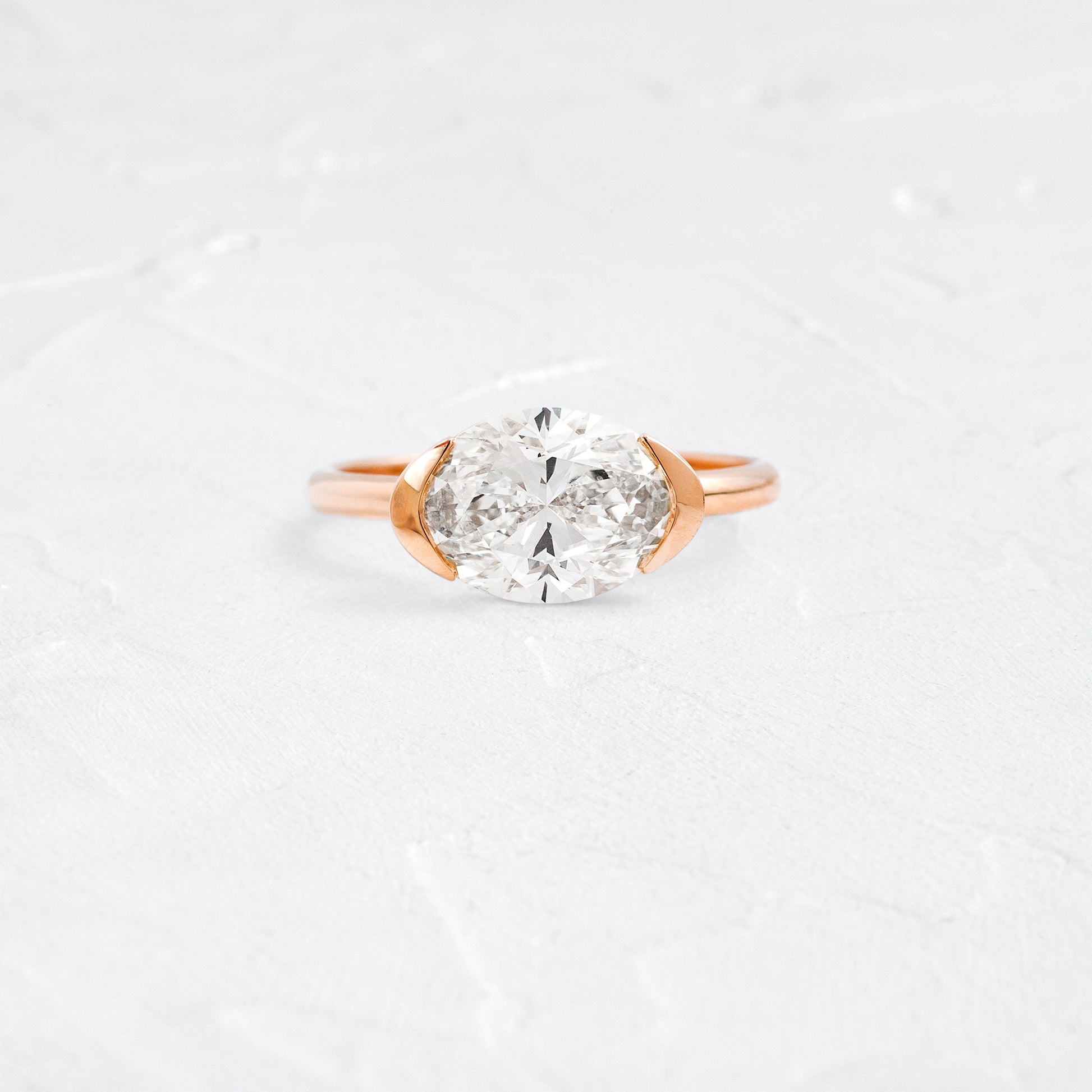 East West Solitaire Half Bezel-Oval Lab Grown Diamond Engagement Ring - Lifestyle