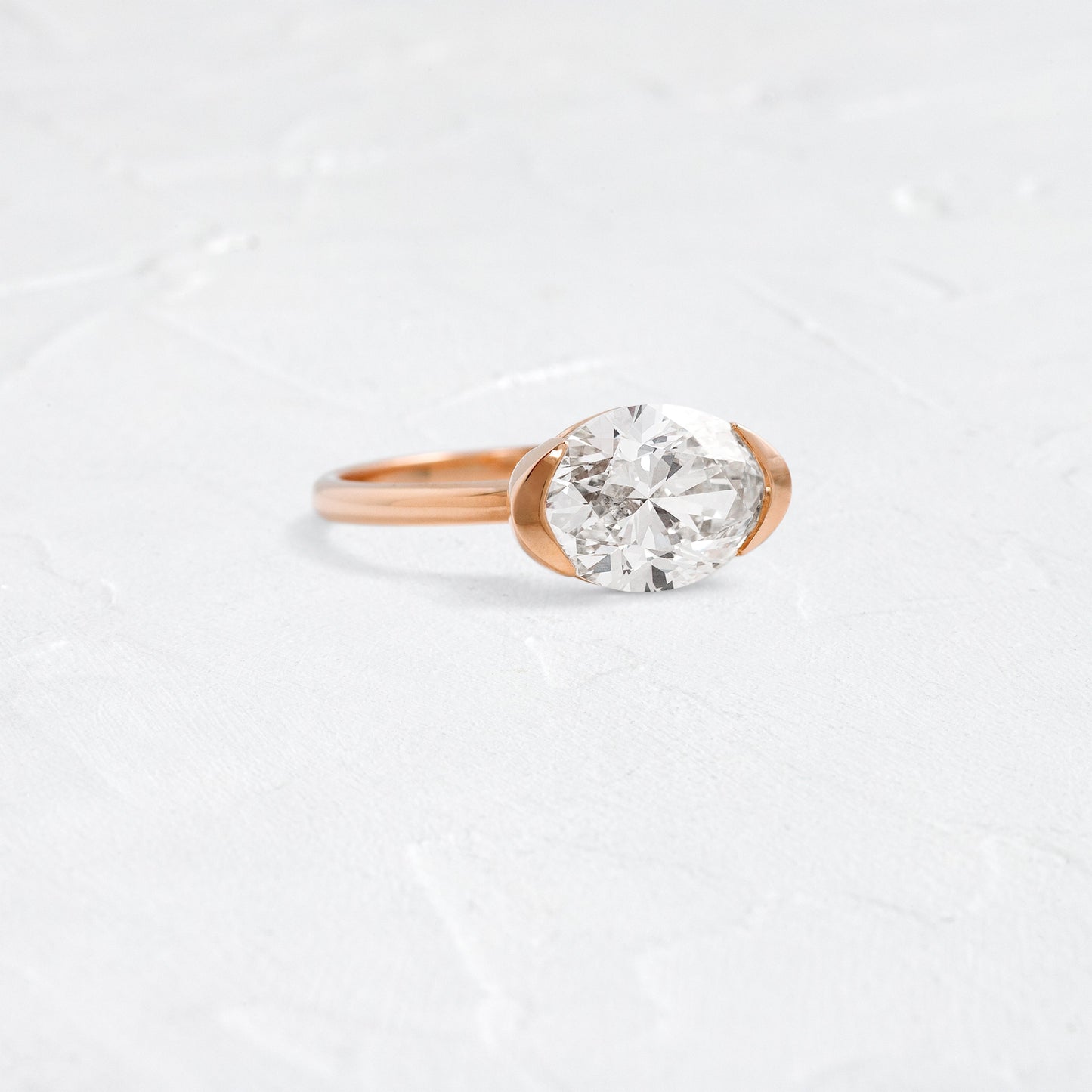 East West Solitaire Half Bezel-Oval Lab Grown Diamond Engagement Ring - Front view