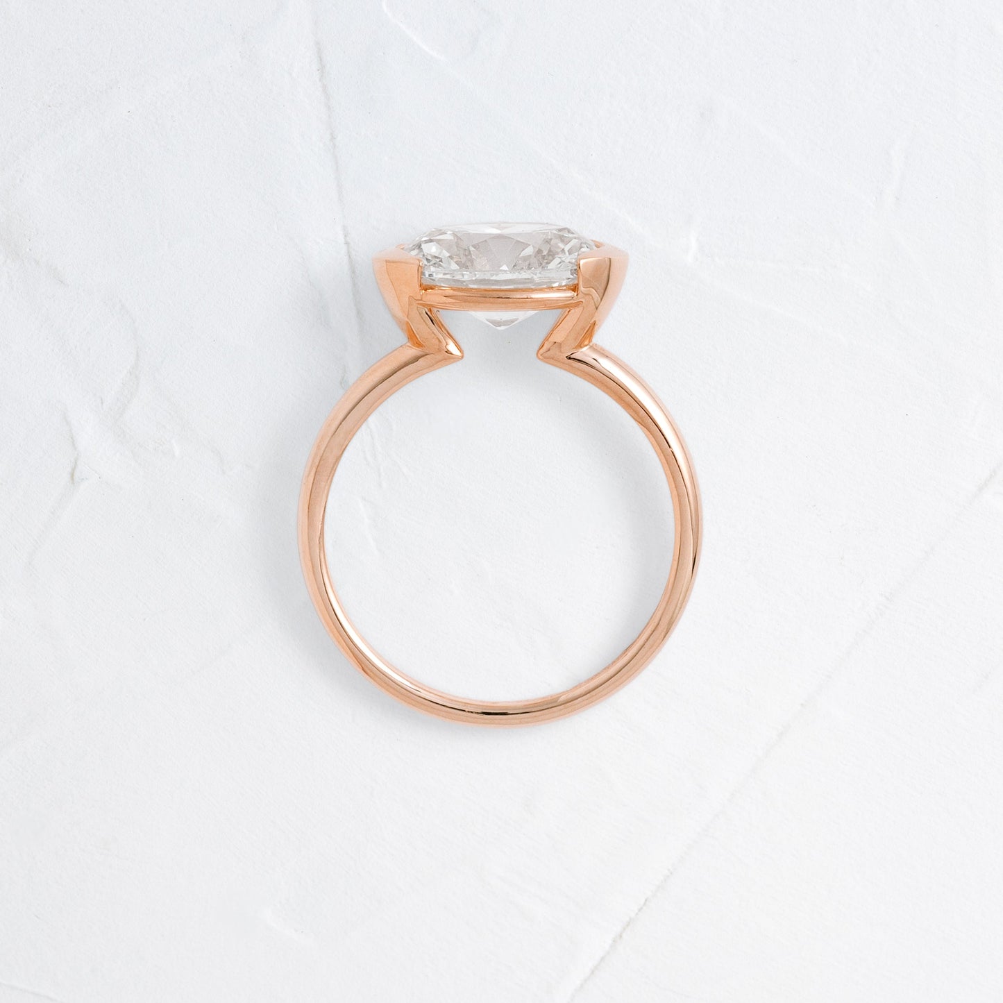 East West Solitaire Half Bezel-Oval Lab Grown Diamond Engagement Ring - Side view