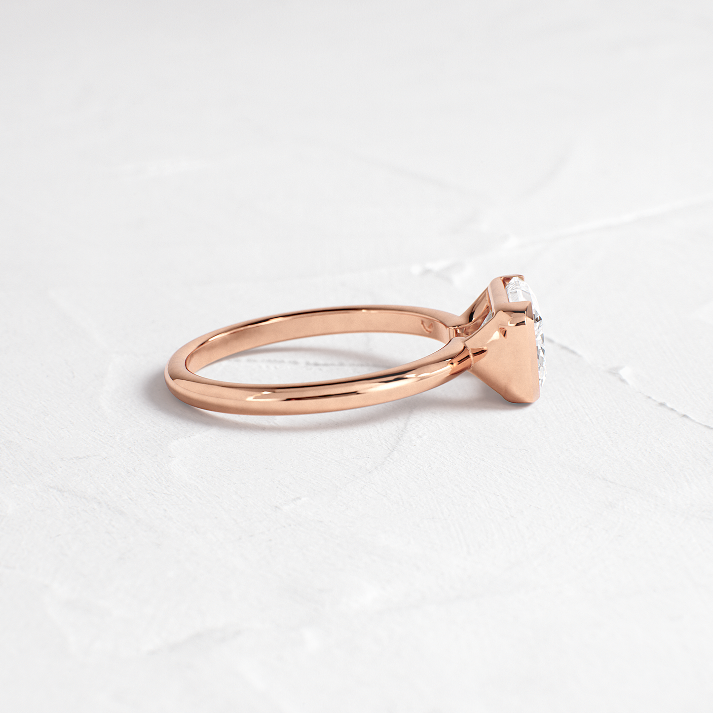 East West Solitaire Half Bezel-Radiant Lab Grown Diamond Engagement Ring - Detail view