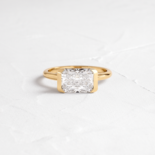 East West Solitaire Half Bezel-Radiant Lab Grown Diamond Engagement Ring - Front view