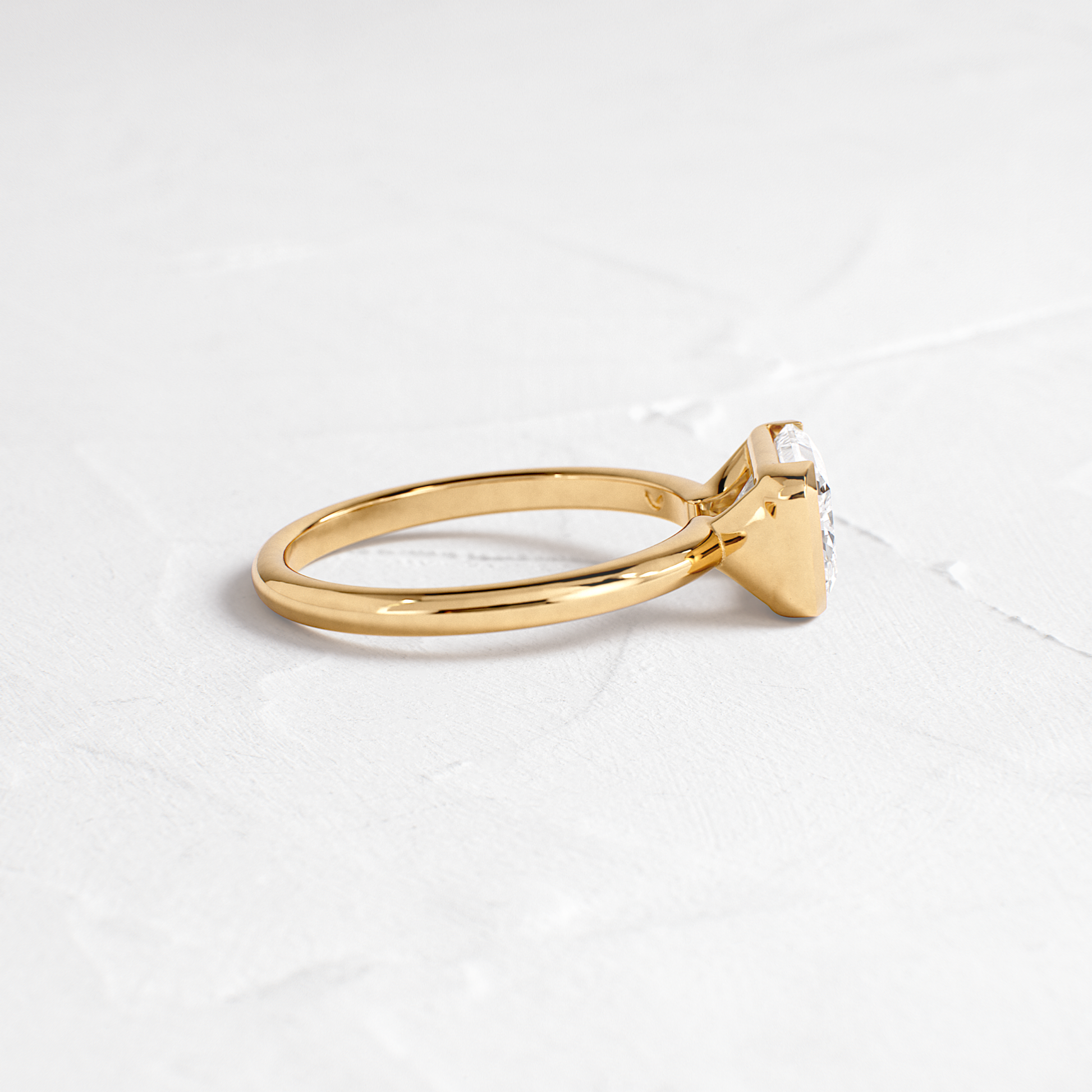 East West Solitaire Half Bezel-Radiant Lab Grown Diamond Engagement Ring - Side view