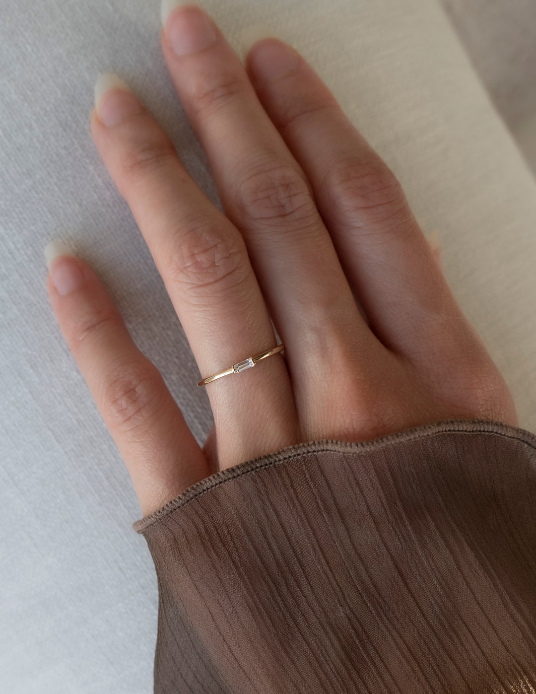 East West Solitaire Half Bezel | Stackable Ring- 0.06 CT Baguette Moissanite Wedding BandEast West Solitaire Half Bezel | Stackable Ring- 0.06 CT Baguette Moissanite Wedding Band - Front view