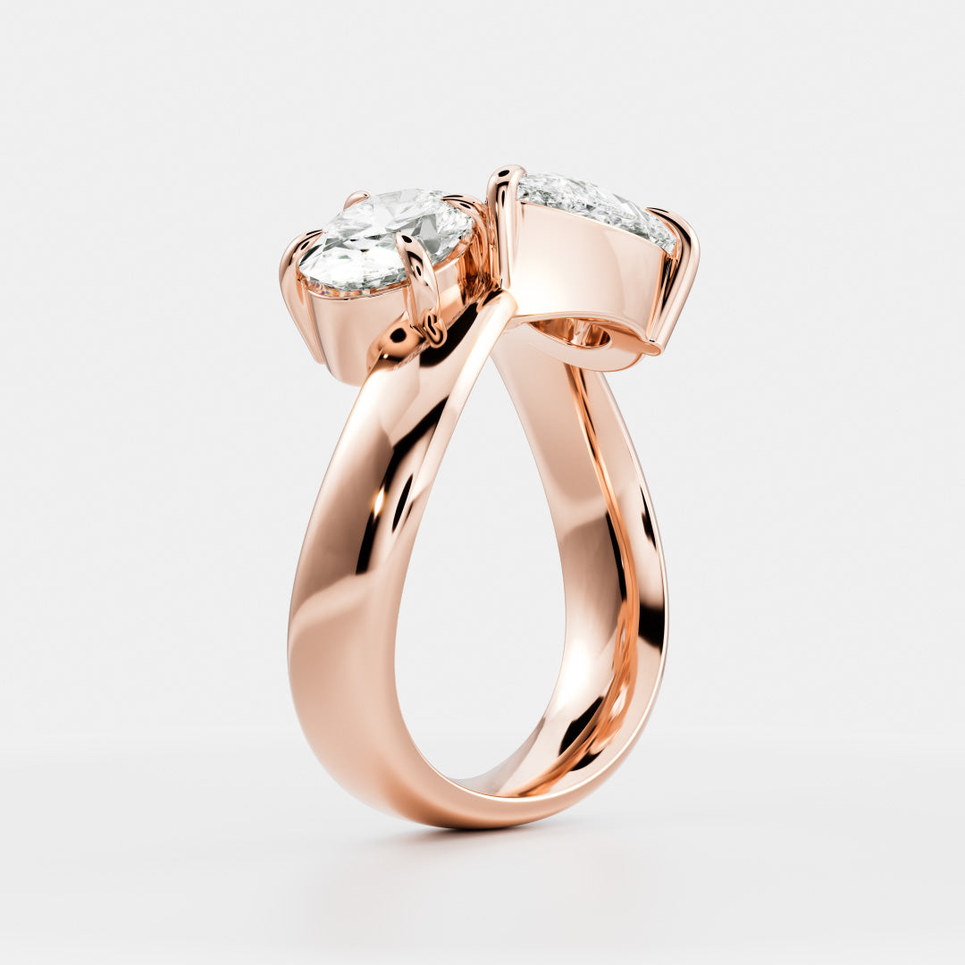 East West Toi Et Moi Curved Band- 1.33 CT Pear & 1.3 CT Oval Moissanite Engagement RingEast West Toi Et Moi Curved Band- 1.33 CT Pear & 1.3 CT Oval Moissanite Engagement Ring - Detail view
