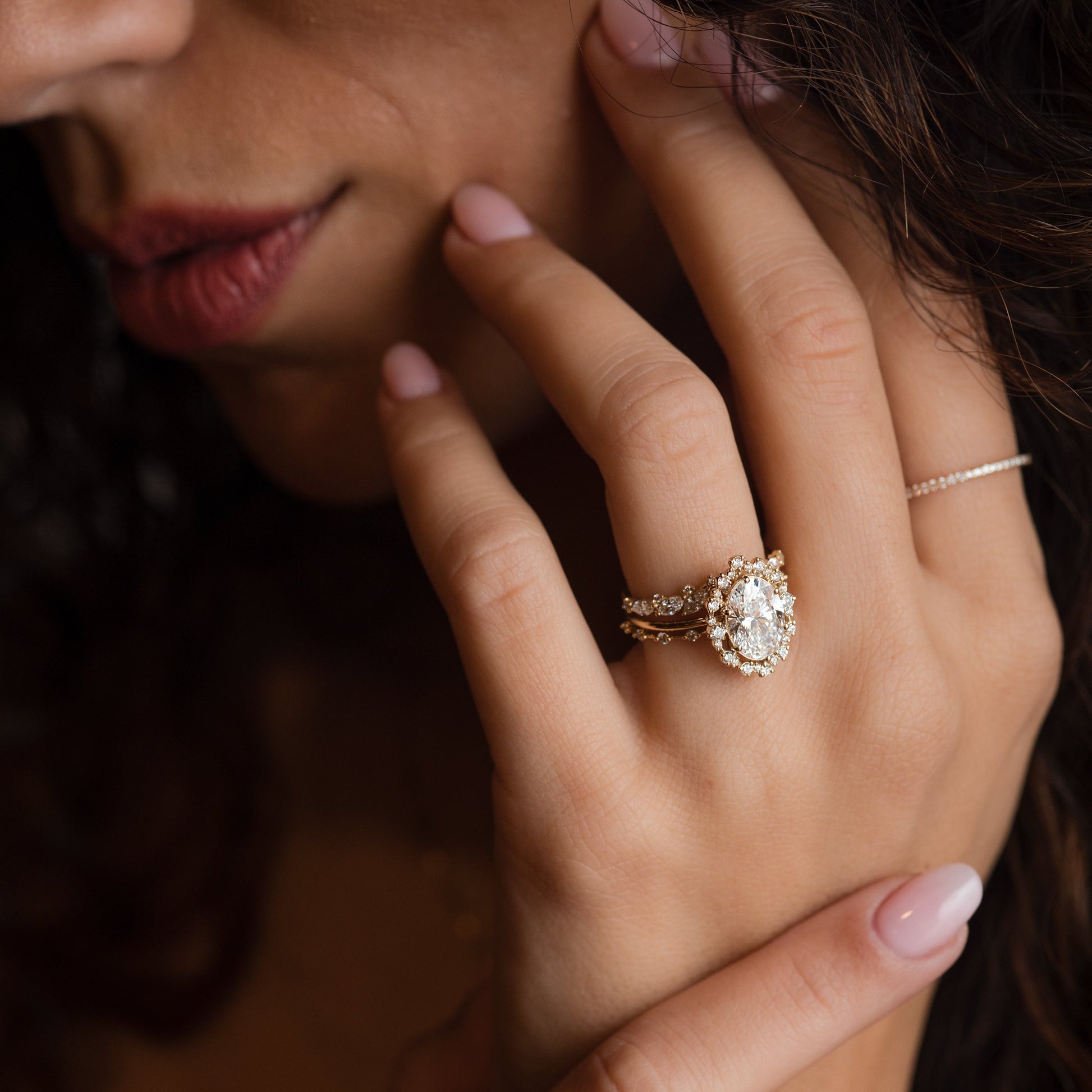 Graduated Halo-Oval Lab Grown Diamond Engagement Ring - Front view