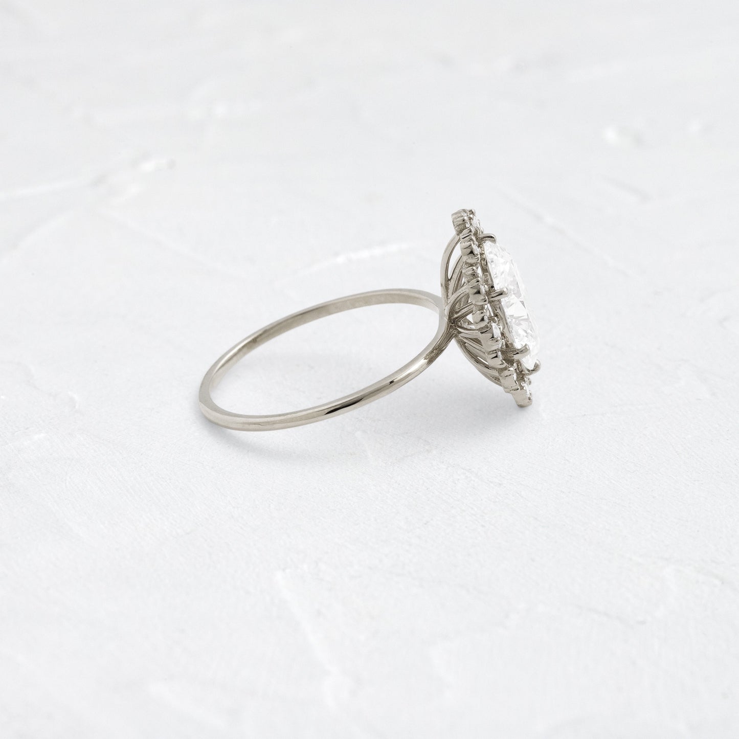 Graduated Halo-Oval Lab Grown Diamond Engagement Ring - Lifestyle