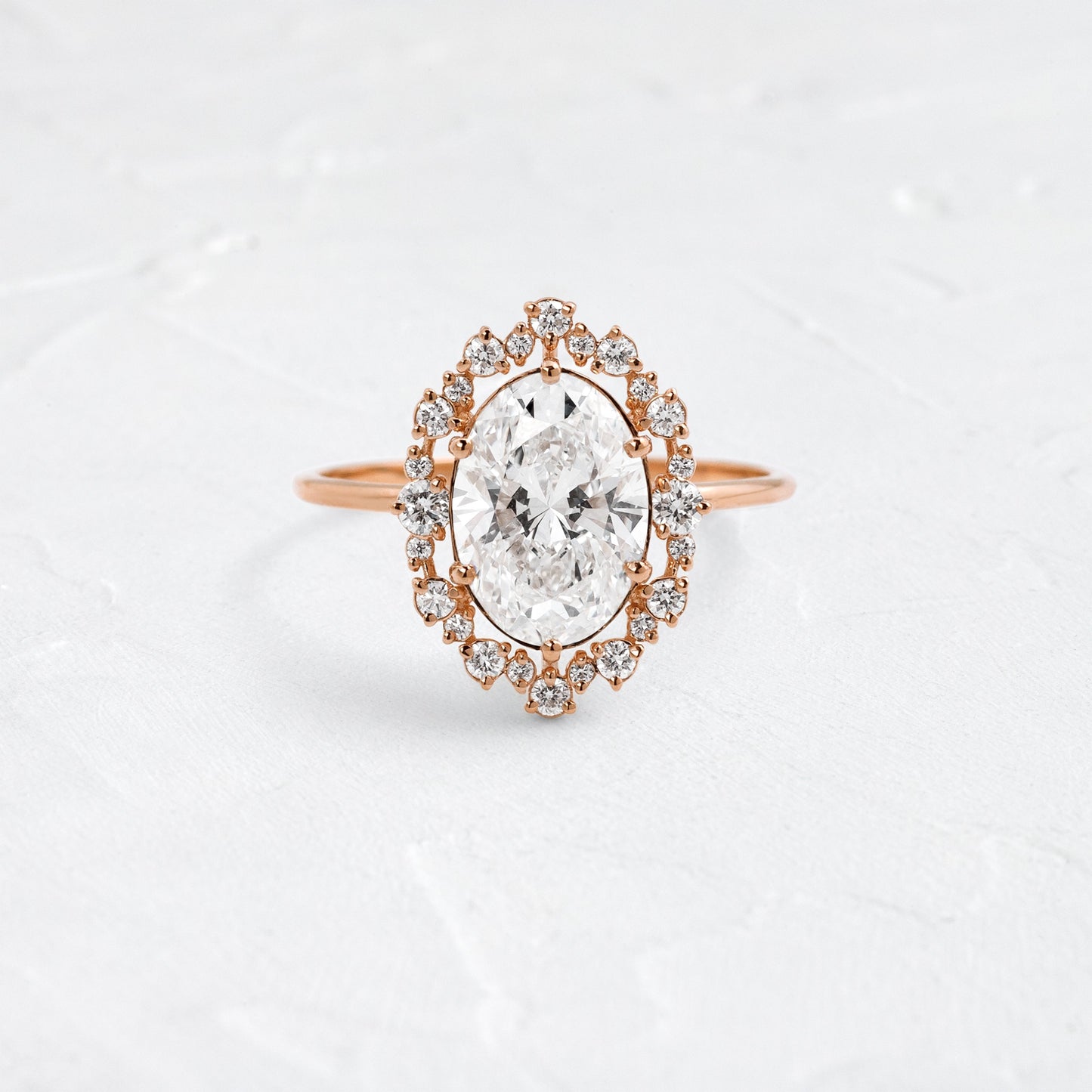 Graduated Halo-Oval Lab Grown Diamond Engagement Ring - Side view