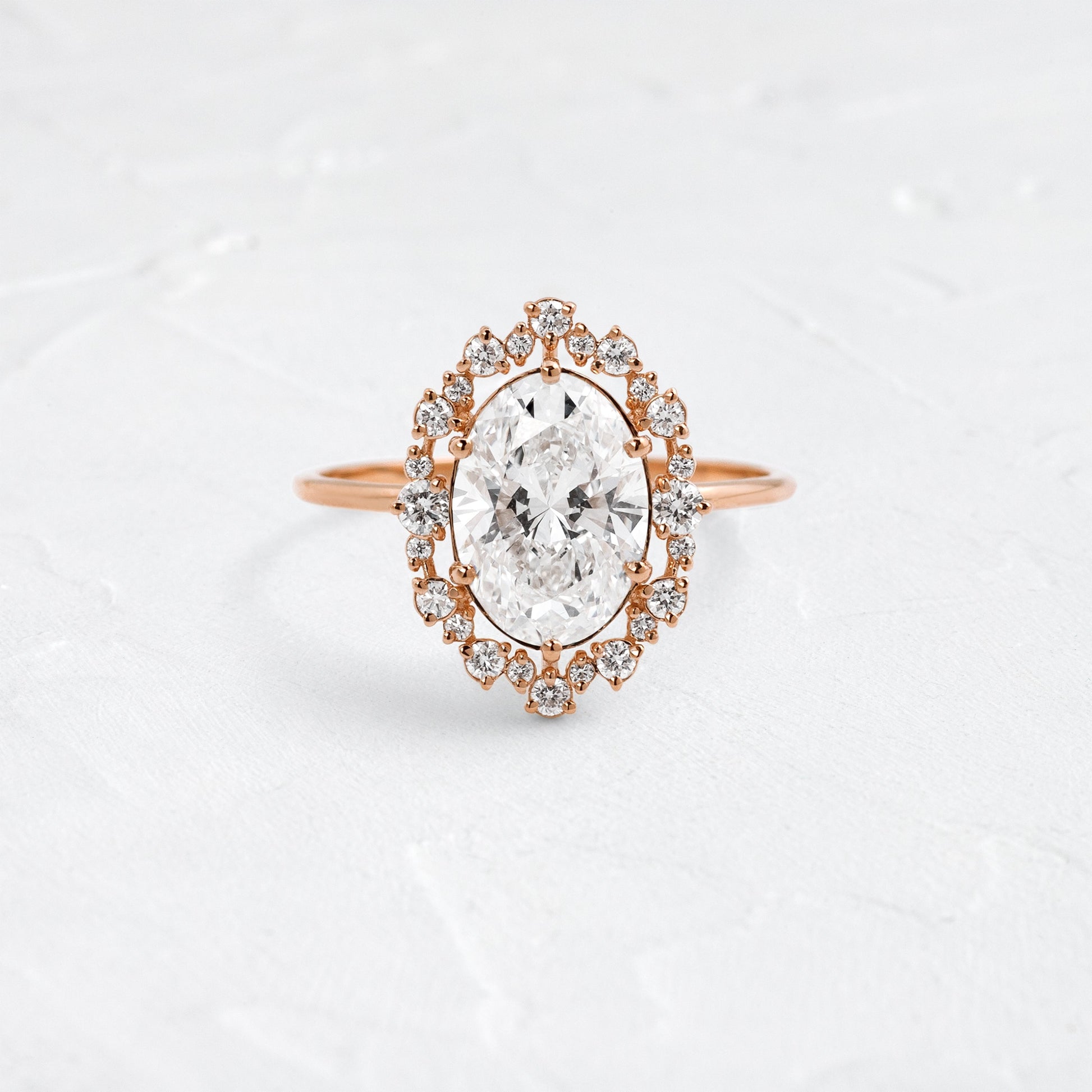 Graduated Halo-Oval Lab Grown Diamond Engagement Ring - Side view