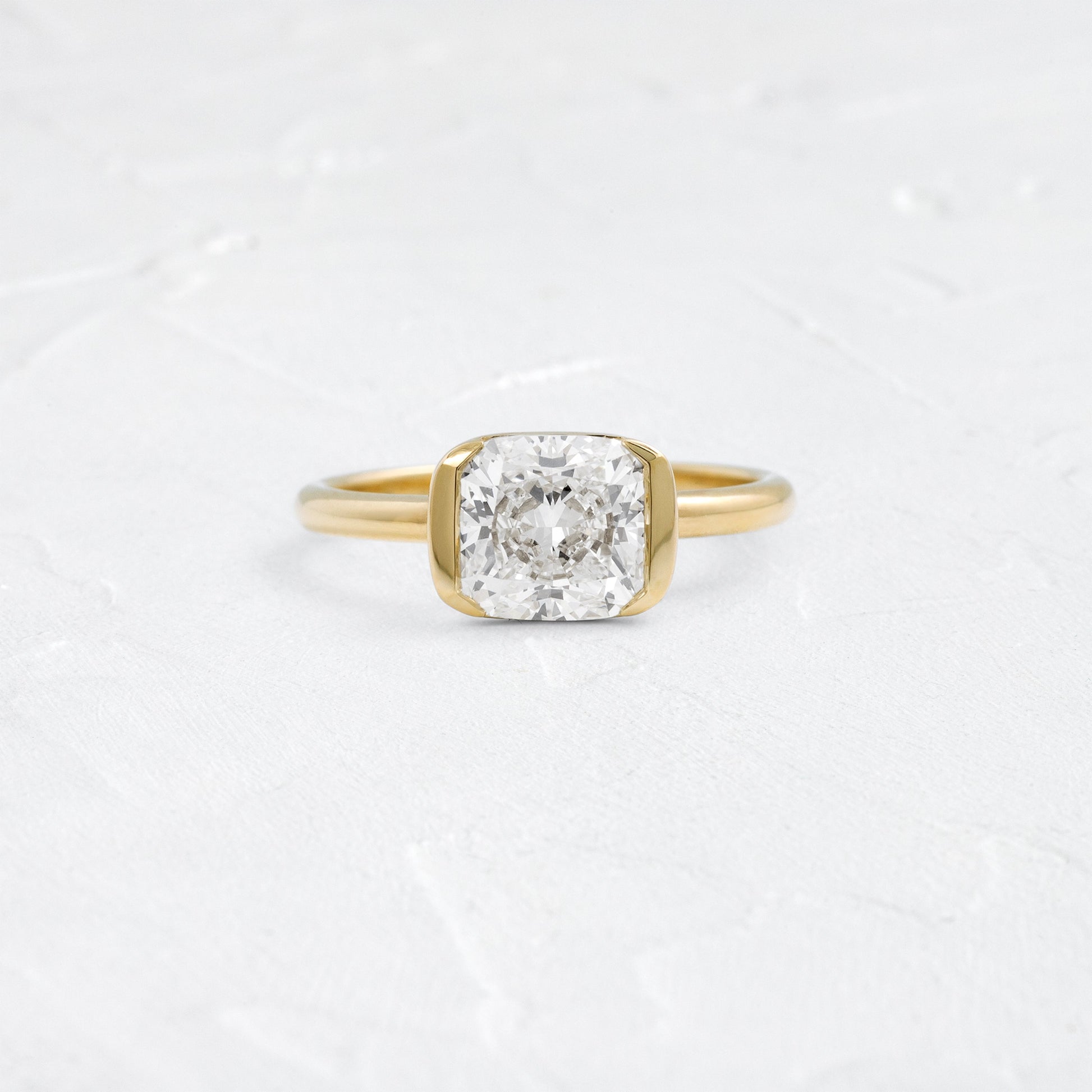 Half Bezel & East West-Elongated Cushion Lab Grown Diamond Engagement Ring - Front view