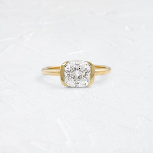 Half Bezel & East West-Elongated Cushion Lab Grown Diamond Engagement Ring - Front view