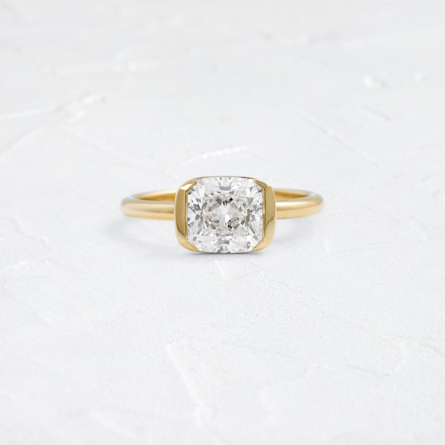Half Bezel & East West-Elongated Cushion Lab Grown Diamond Engagement Ring - Front view