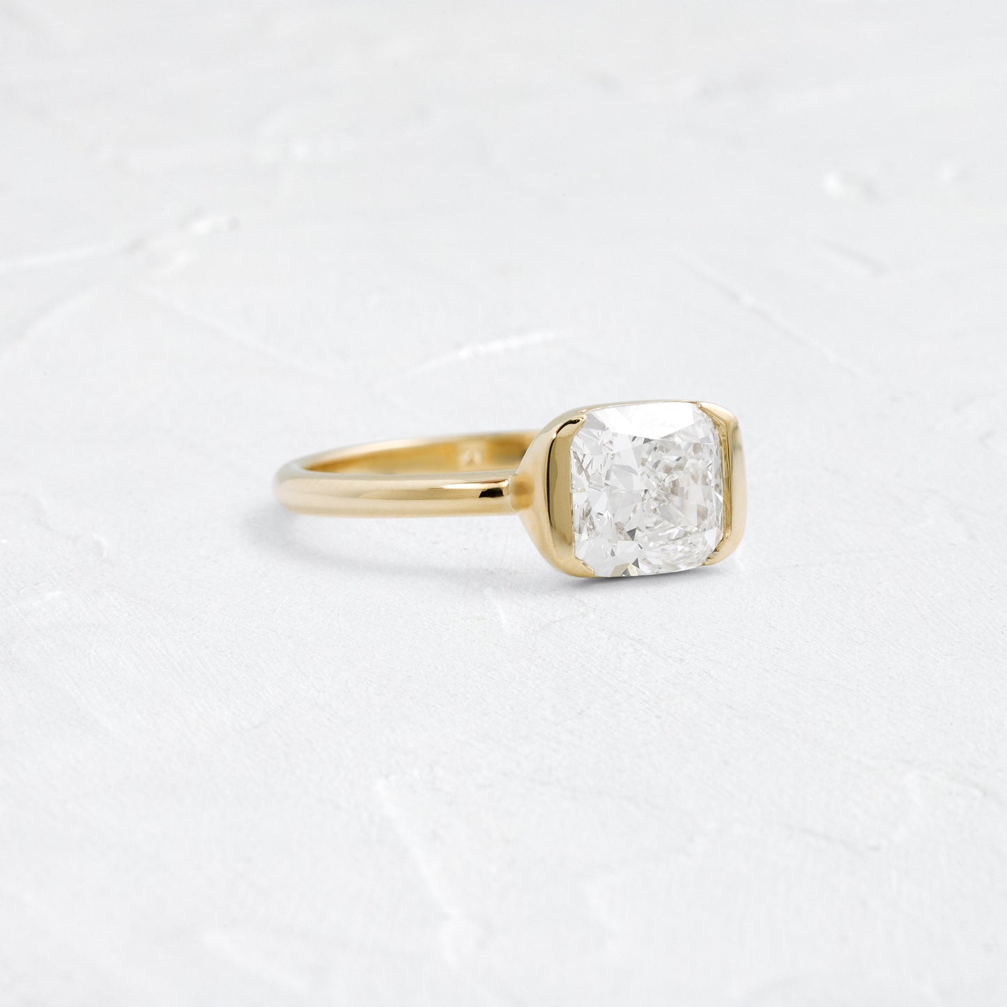 Half Bezel & East West-Elongated Cushion Lab Grown Diamond Engagement Ring - Front view