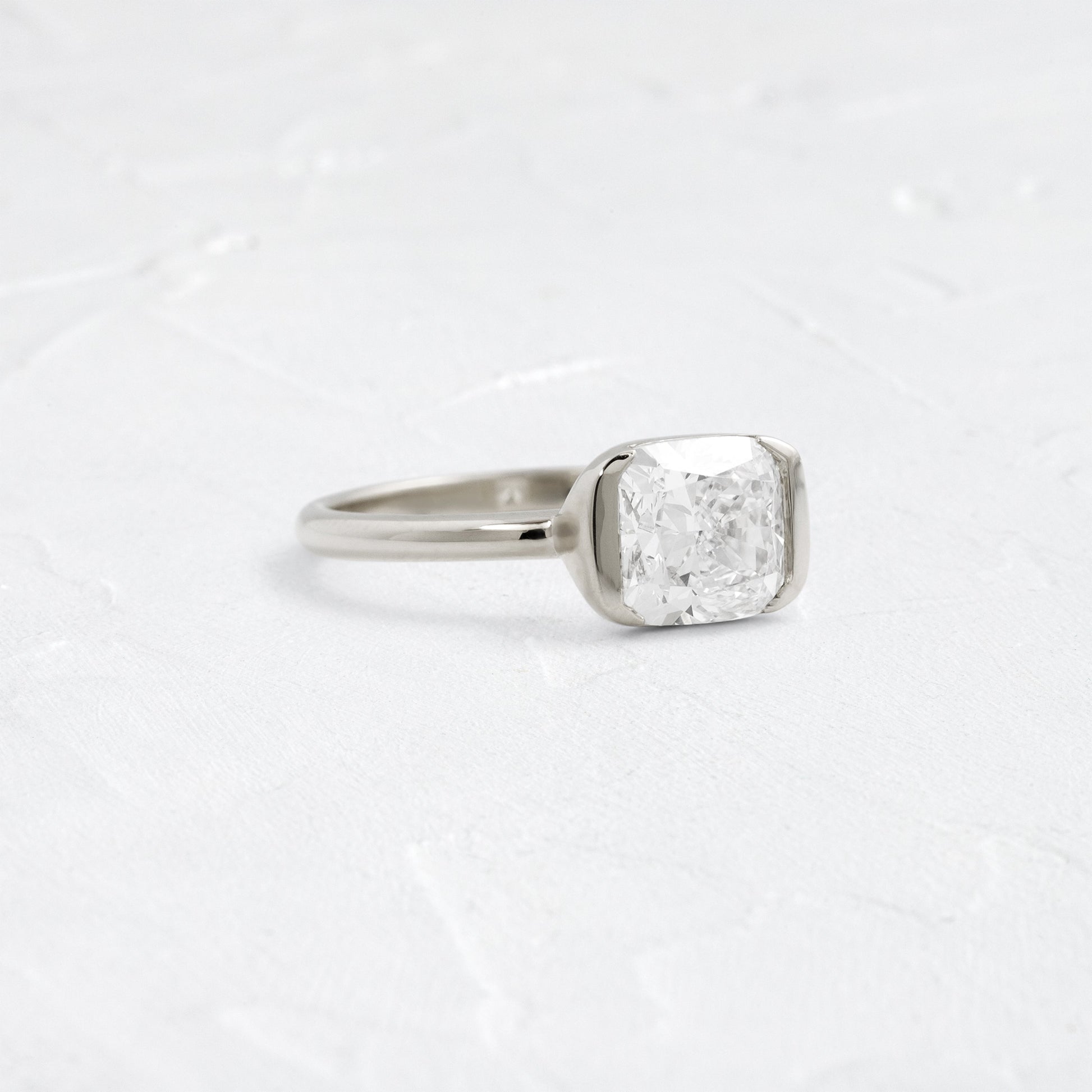Half Bezel & East West-Elongated Cushion Lab Grown Diamond Engagement Ring - On model