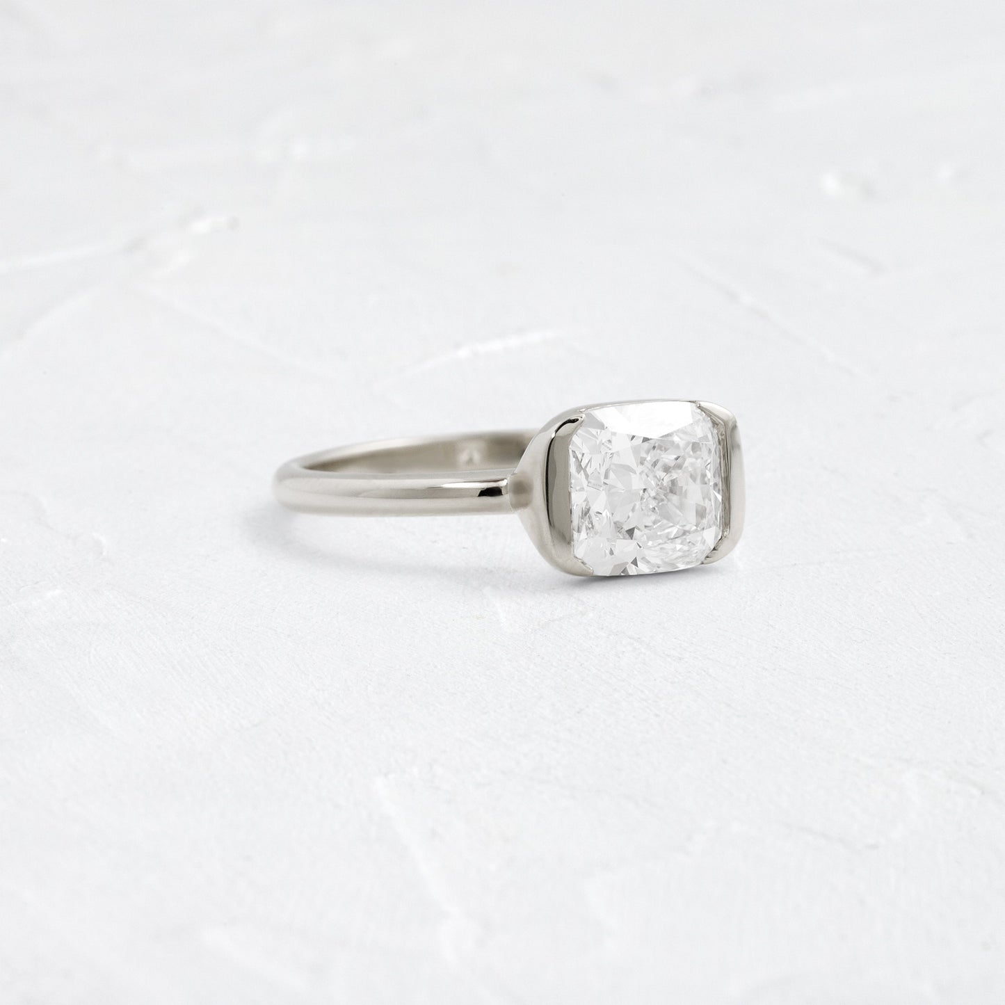 Half Bezel & East West-Elongated Cushion Lab Grown Diamond Engagement Ring - On model