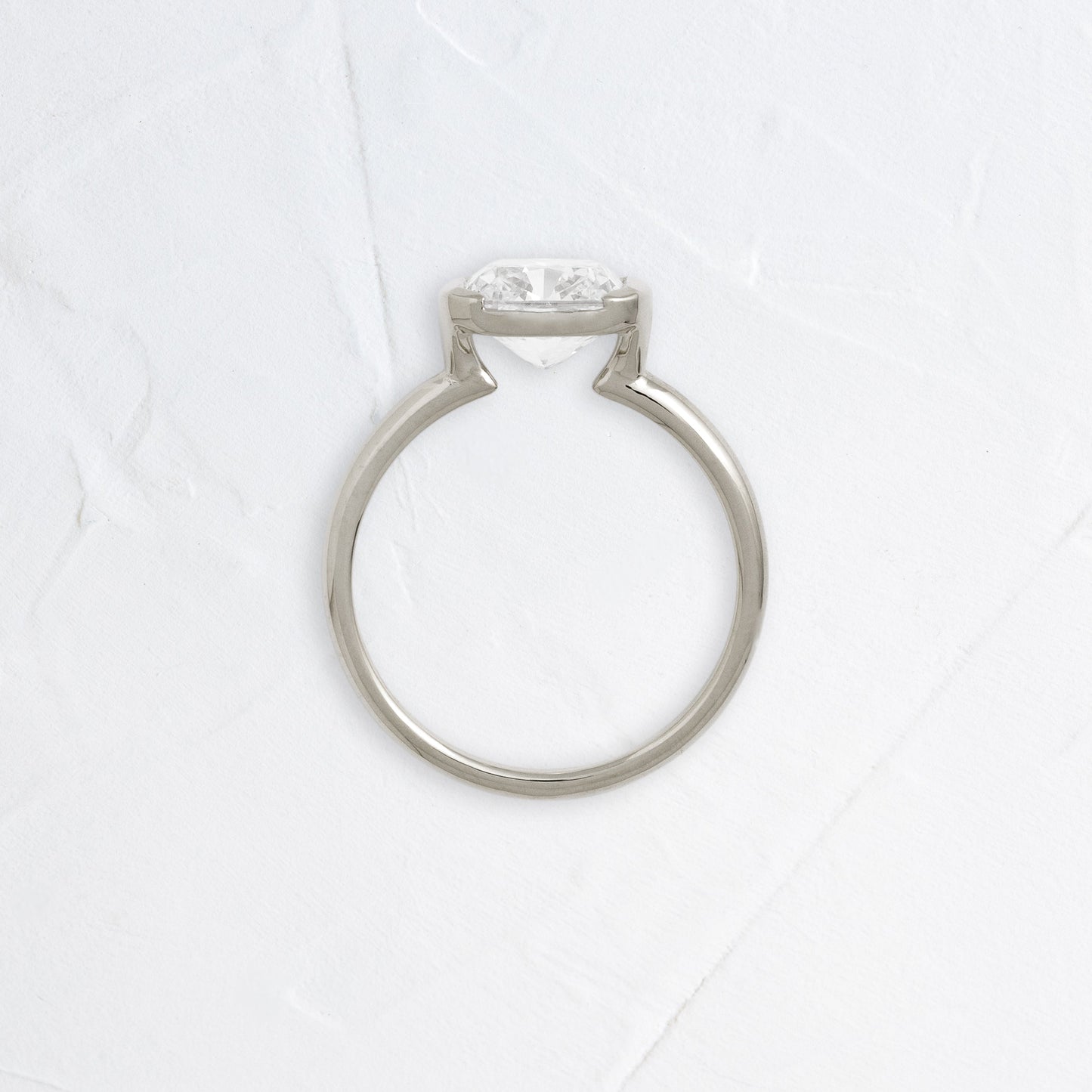 Half Bezel & East West-Elongated Cushion Lab Grown Diamond Engagement Ring - Front view