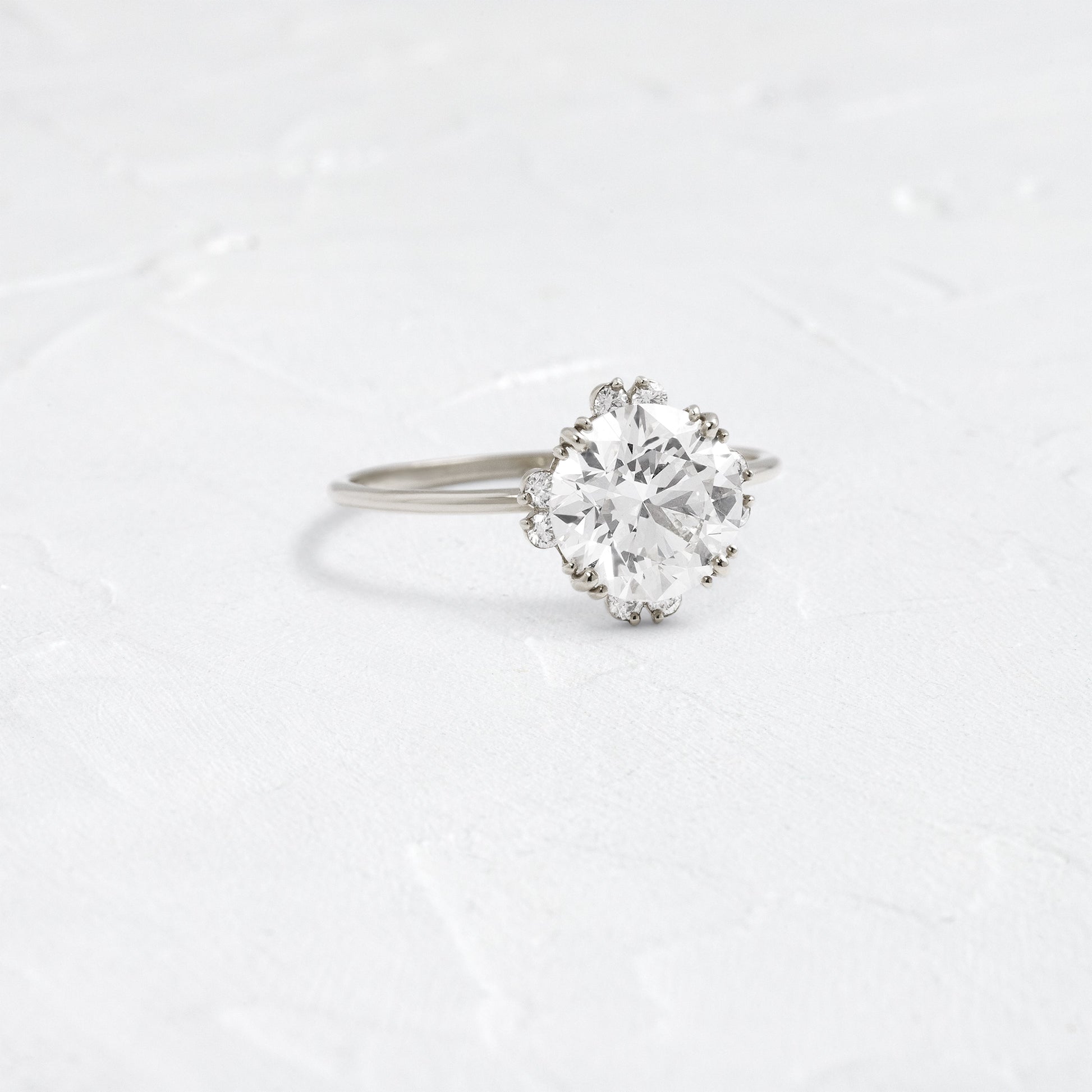Halo & Triple Prong-Round Lab Grown Diamond Engagement Ring - Side view