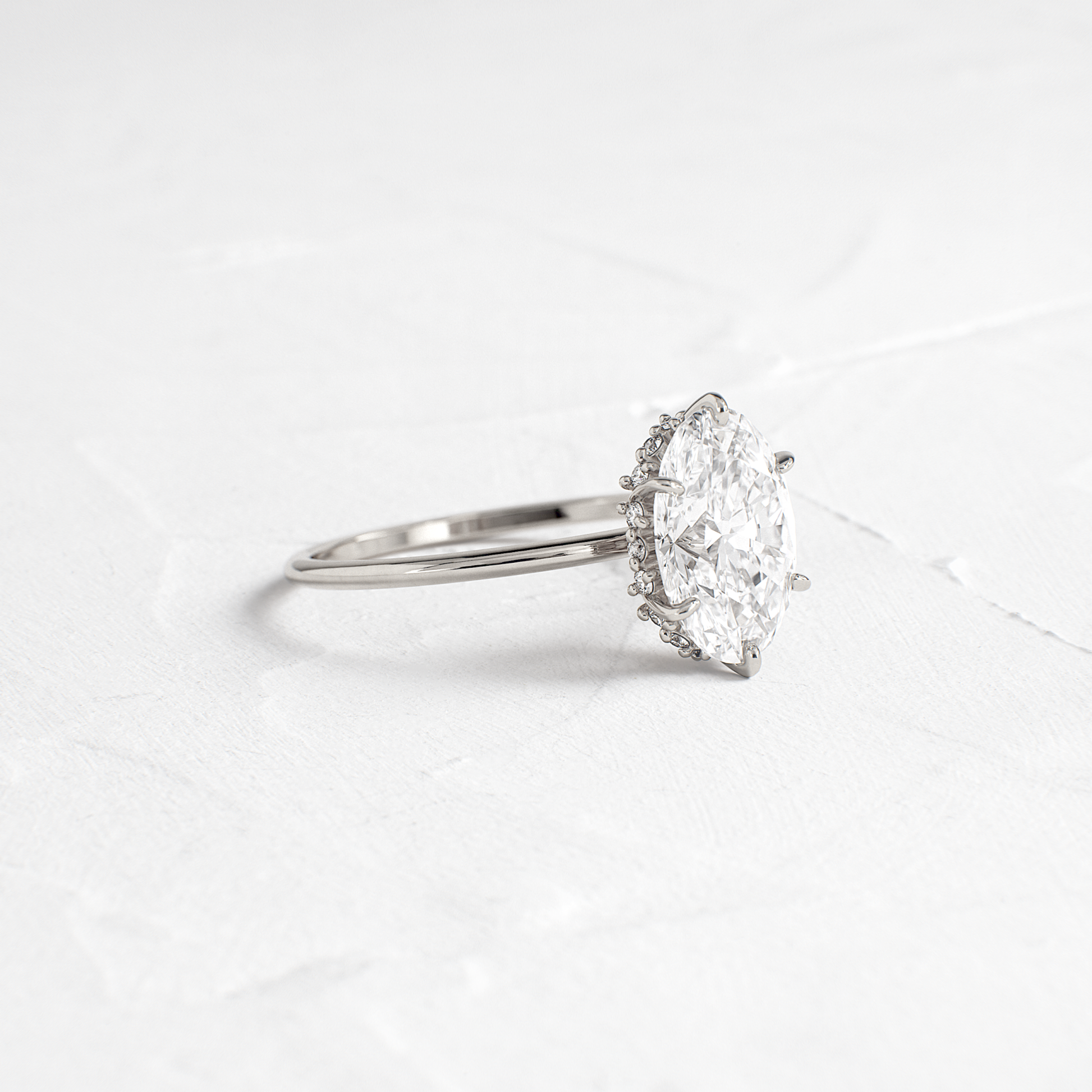 Hidden Halo-Oval Lab Grown Diamond Engagement Ring - On model