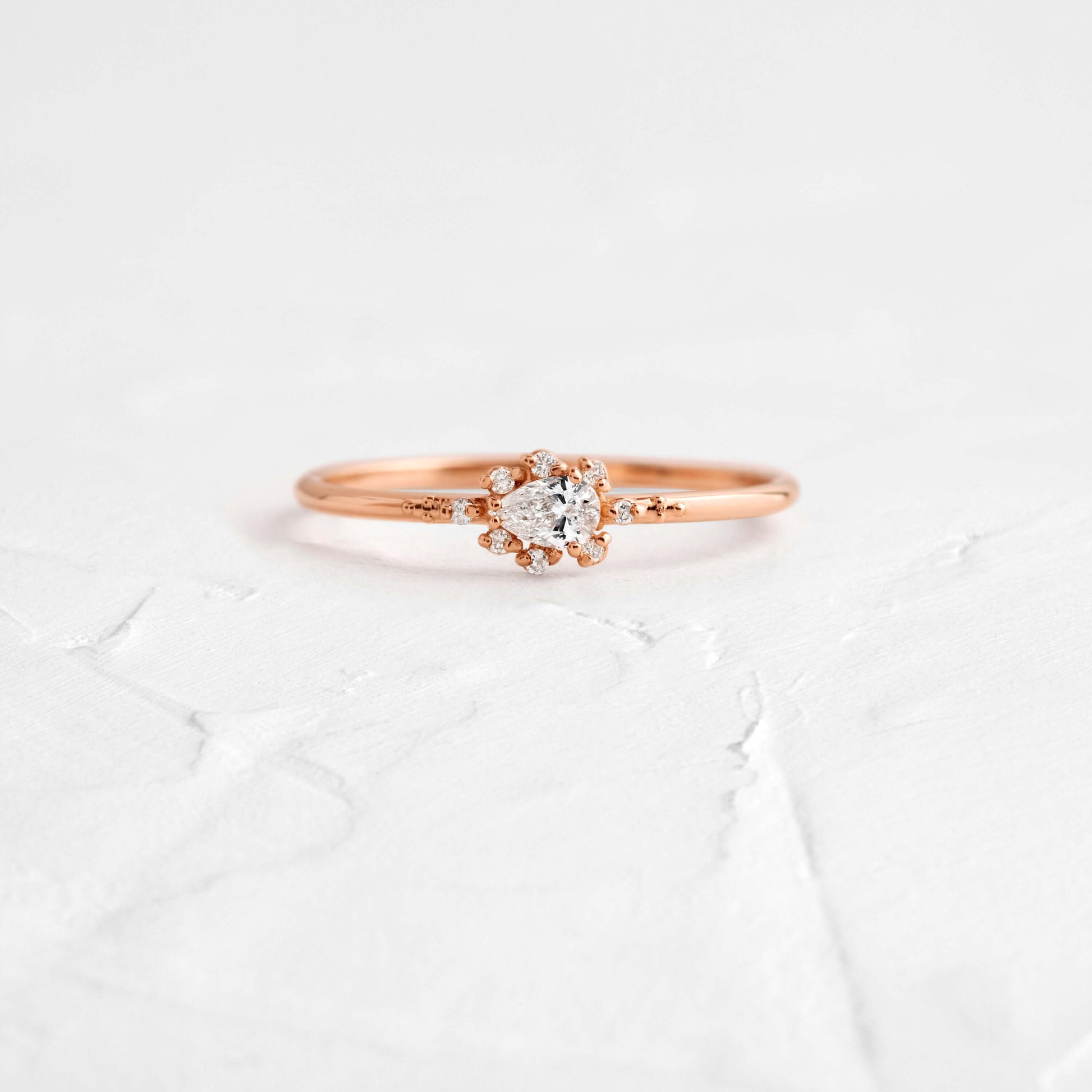 Minimal Halo-Pear Lab Grown Diamond Engagement Ring - On model