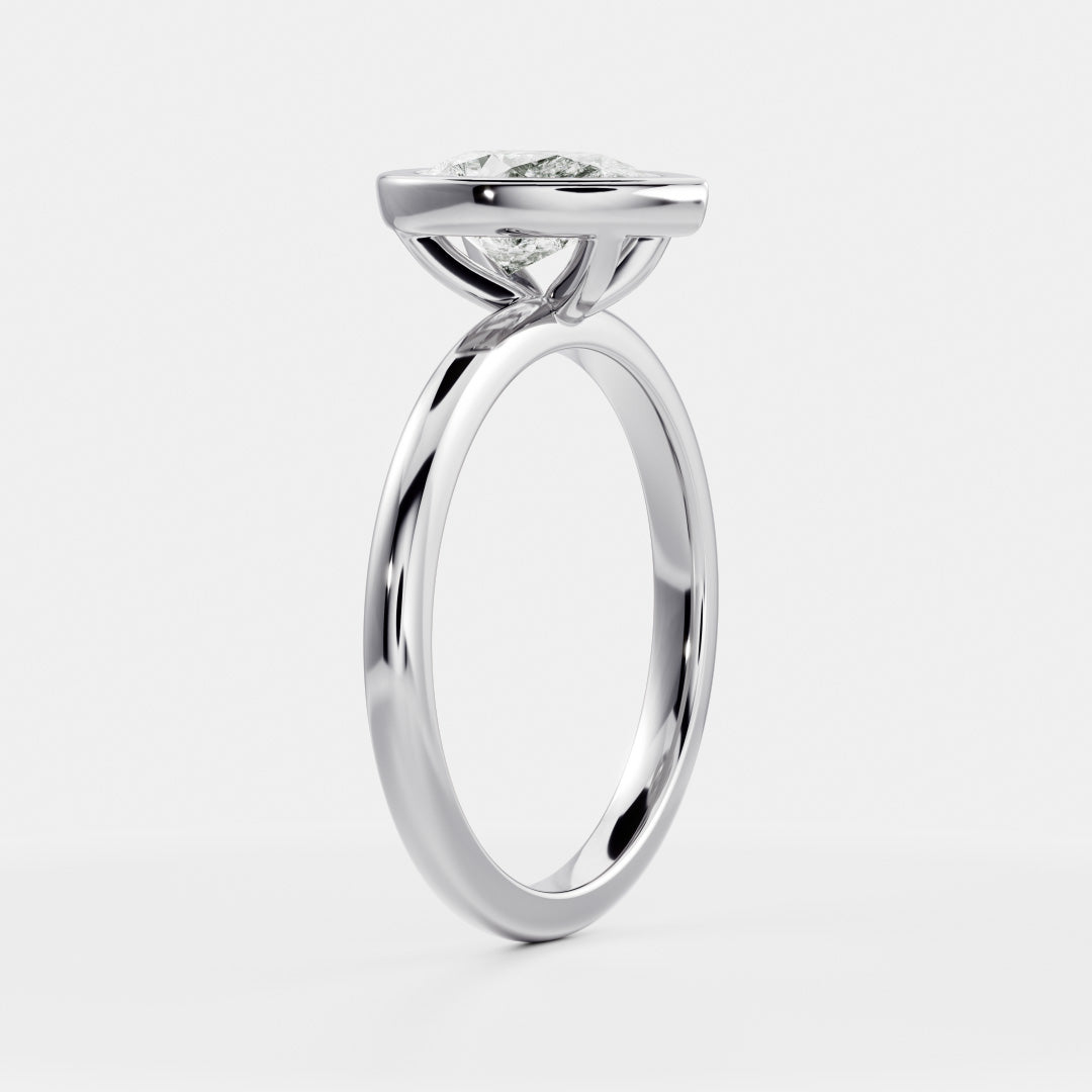 Solitaire Bezel- 1.33 CT Pear Moissanite Engagement RingSolitaire Bezel- 1.33 CT Pear Moissanite Engagement Ring - On model