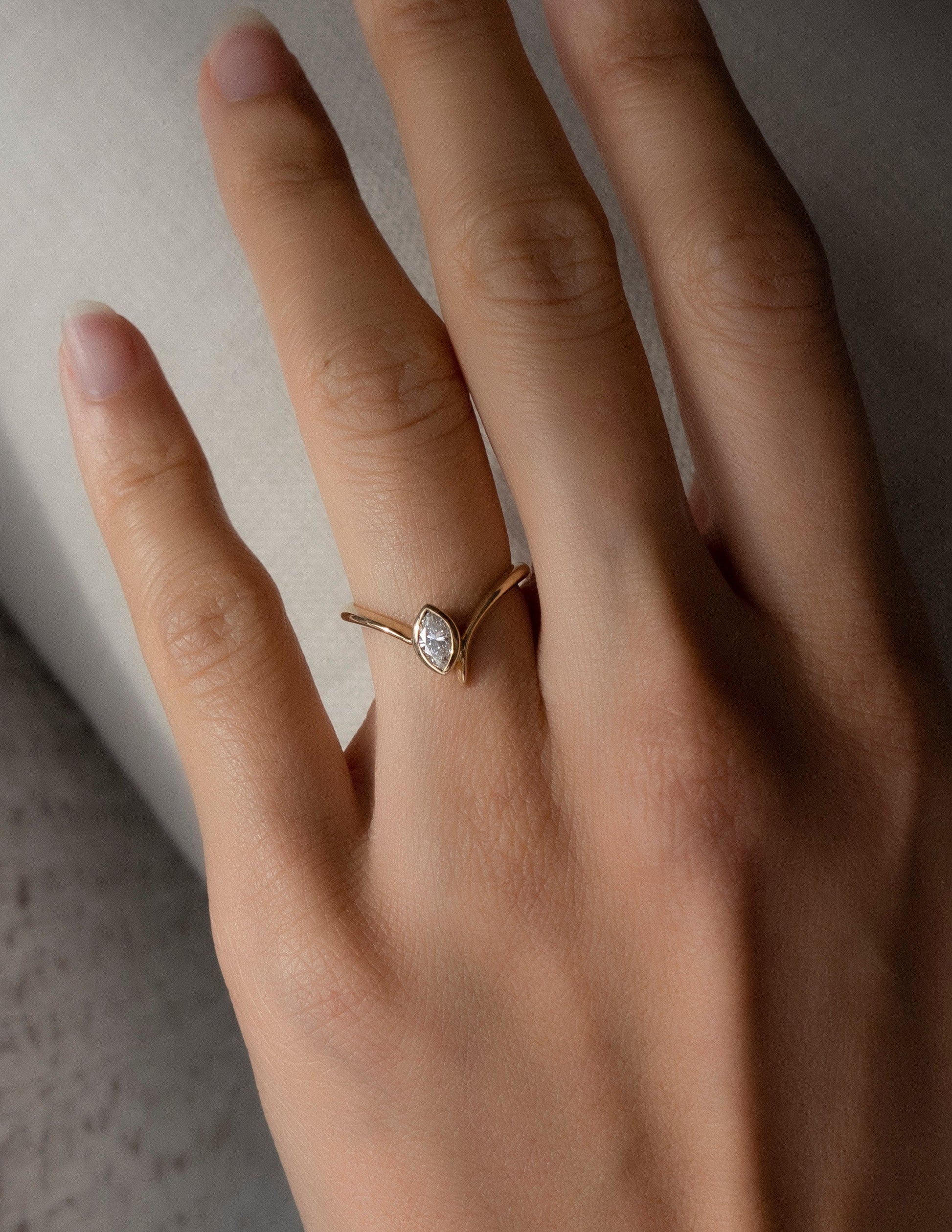 Solitaire Bezel Asymmetrical Band-Marquise Lab Grown Diamond Engagement Ring - On model