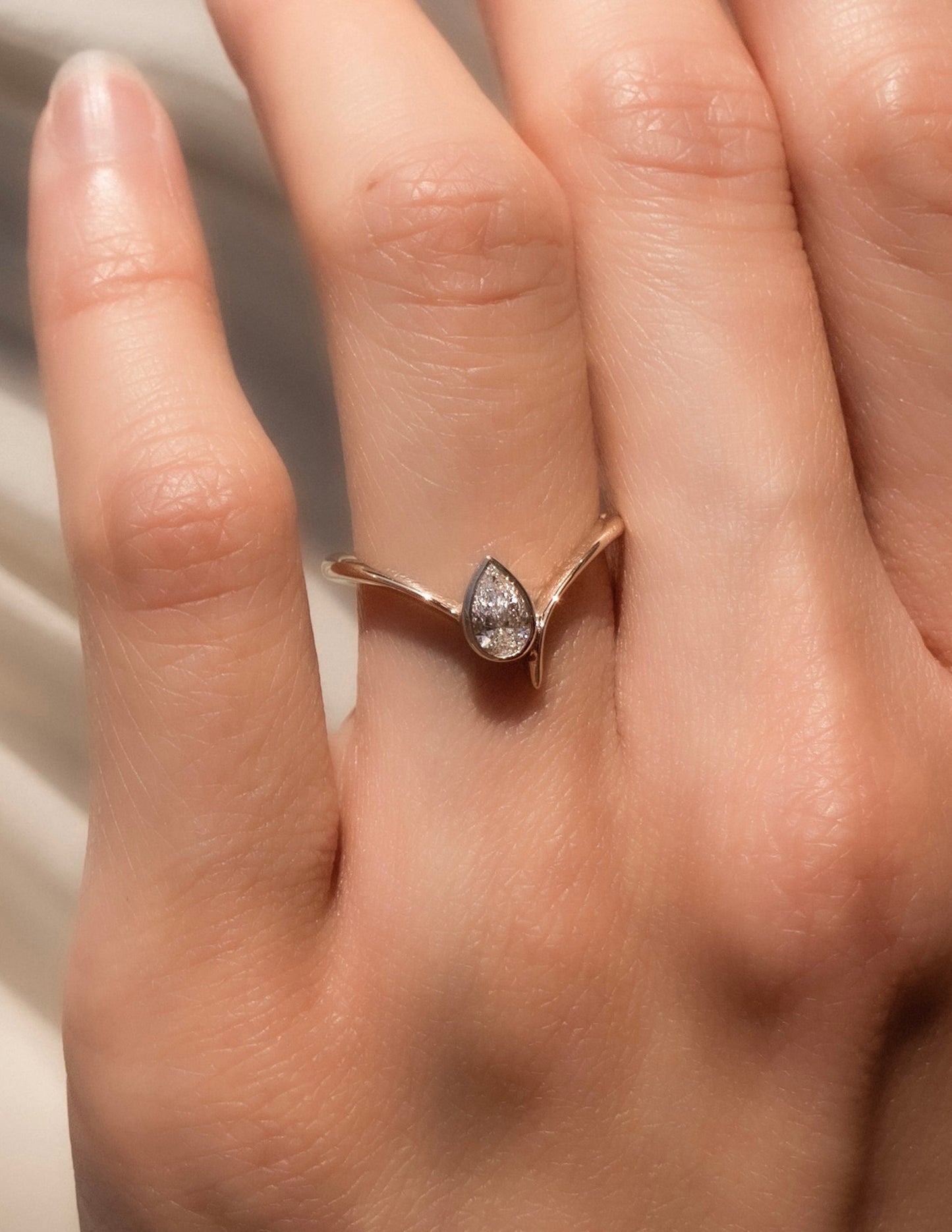 Solitaire Bezel Asymmetrical Band-Pear Lab Grown Diamond Engagement Ring - Front view