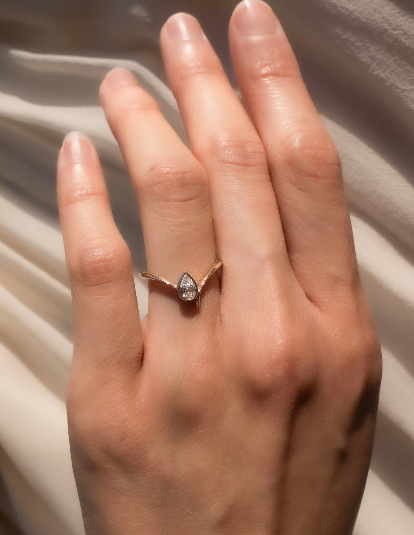 Solitaire Bezel Asymmetrical Band-Pear Lab Grown Diamond Engagement Ring - Side view
