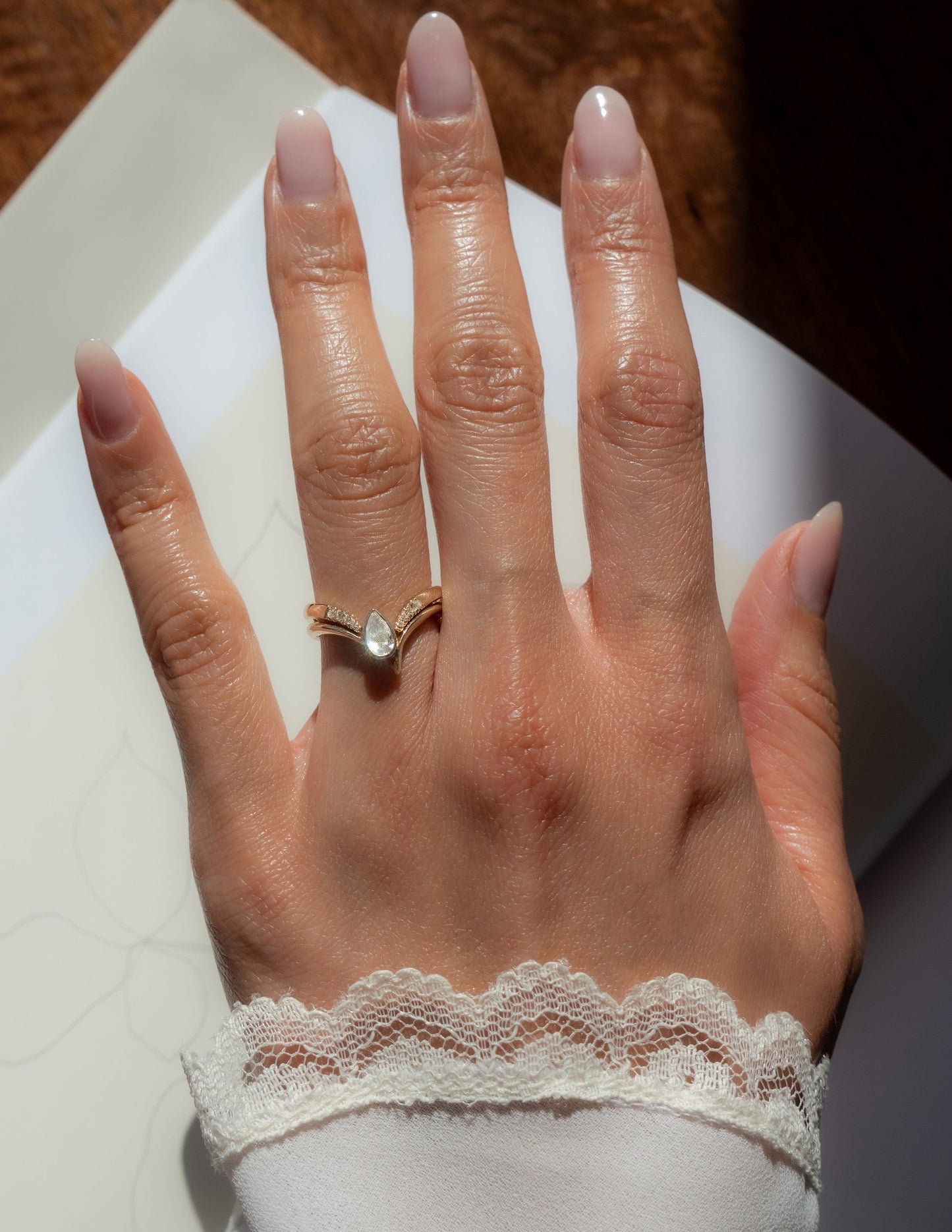 Solitaire Bezel Asymmetrical Band-Pear Lab Grown Diamond Engagement Ring - Lifestyle