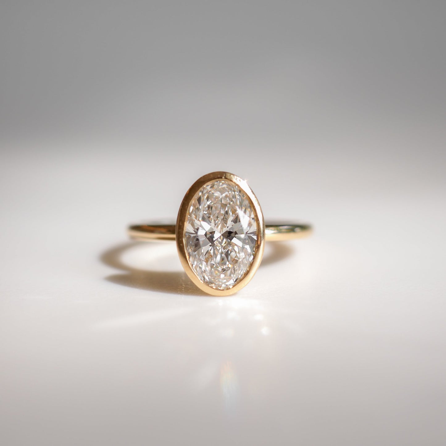 Solitaire Bezel-Oval Lab Grown Diamond Engagement Ring - Front view